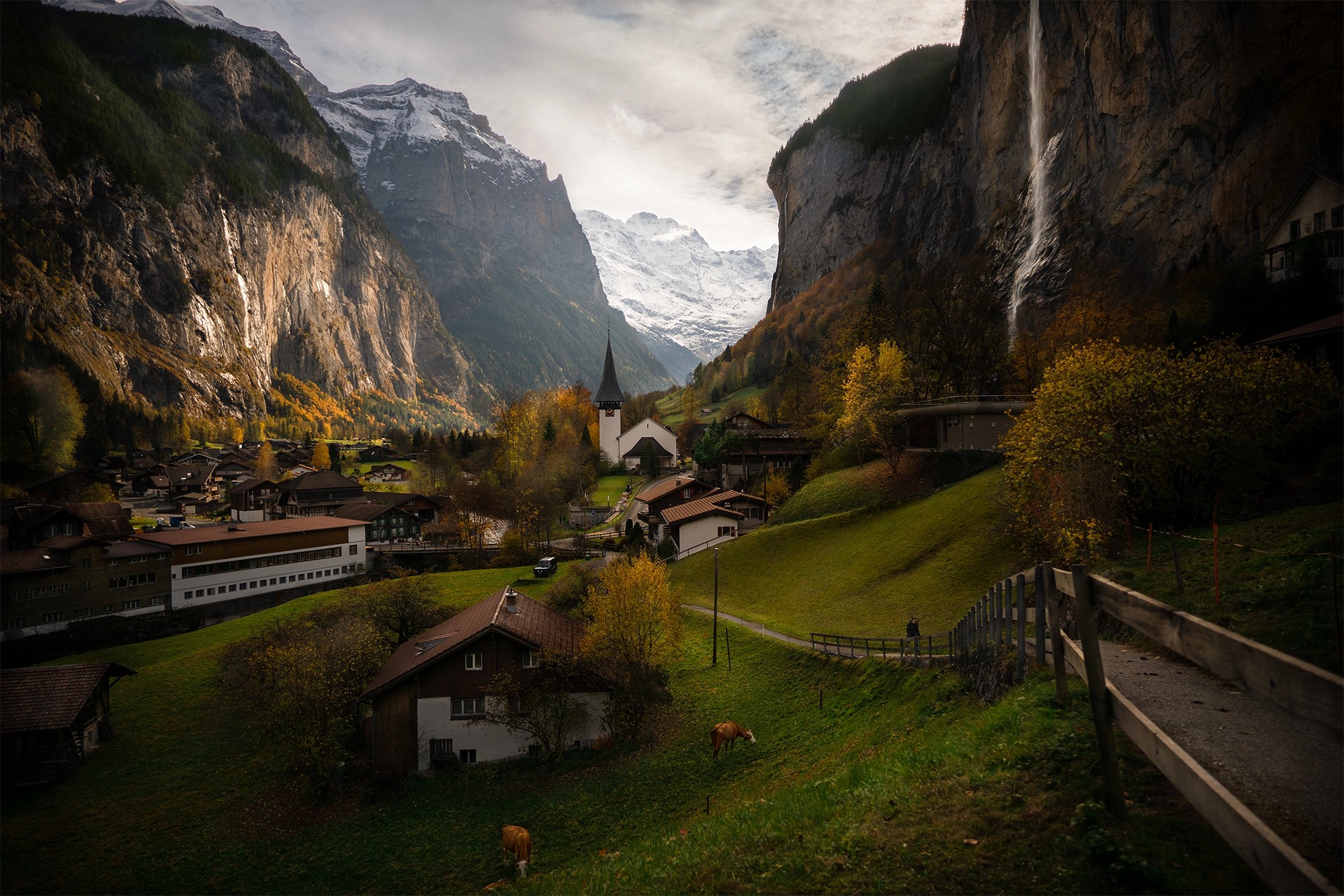 General 2000x1334 Switzerland landscape nature mountains Alps cow snow valley clouds house church path Andrey Brandis photography town 500px