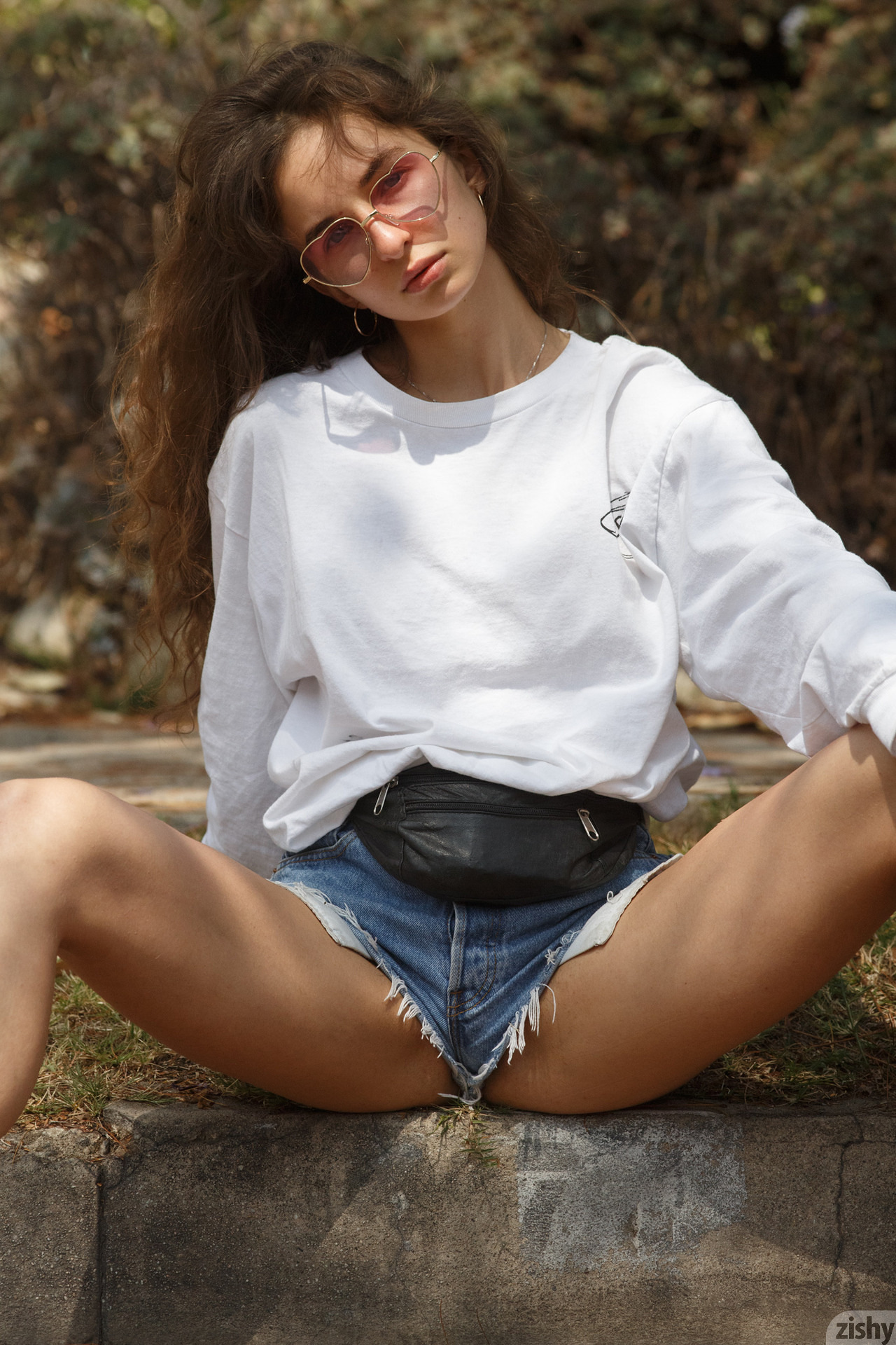 People 1280x1920 Zishy women outdoors jean shorts sunglasses spread legs sitting on the floor white clothing looking at viewer women portrait display brunette