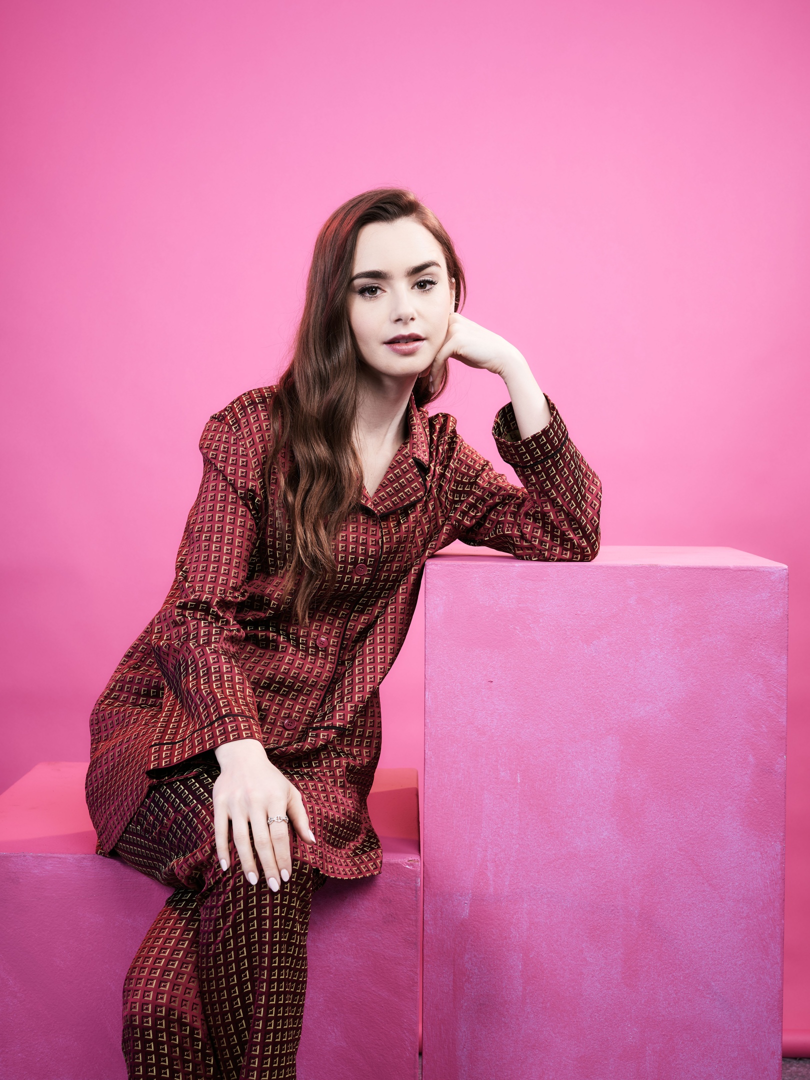 People 1620x2160 Lily Collins women model actress brunette long hair dark hair pink background simple background sitting red clothing