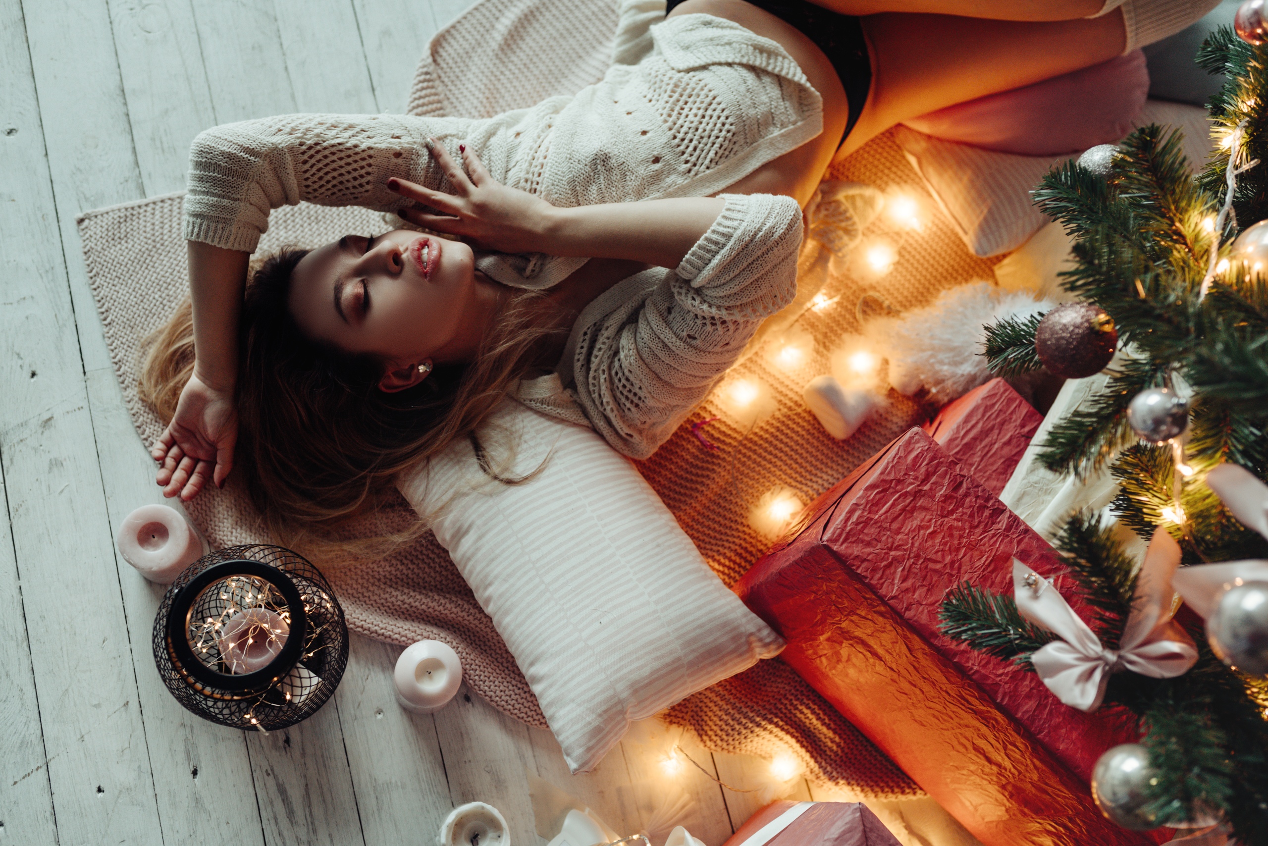 People 2560x1708 women Christmas tree closed eyes black panties brunette candles on the floor stockings pillow presents Darya Grebneva