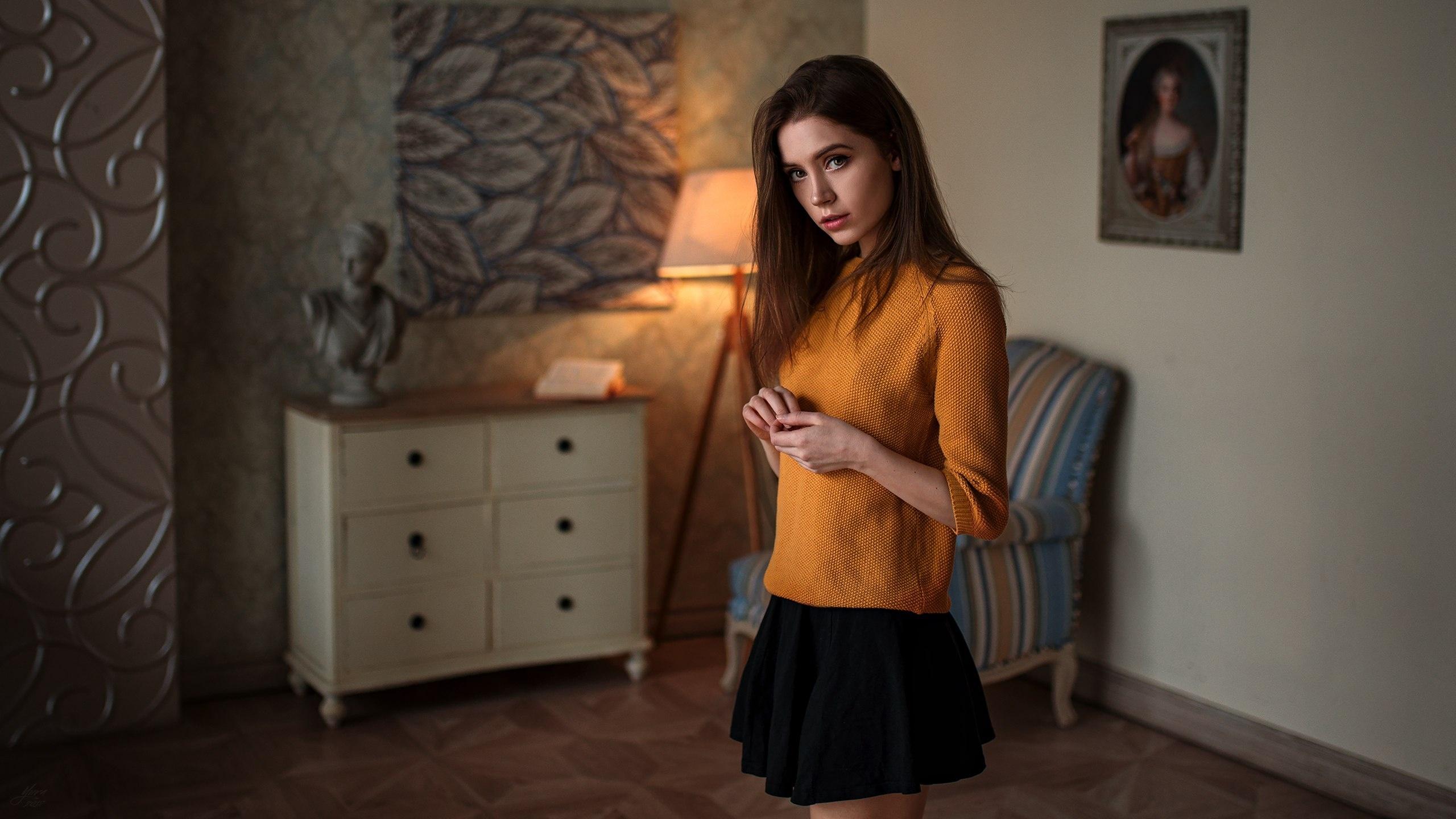 People 2560x1440 model brunette room black skirts yellow sweater women indoors long hair living rooms sweater skirt women