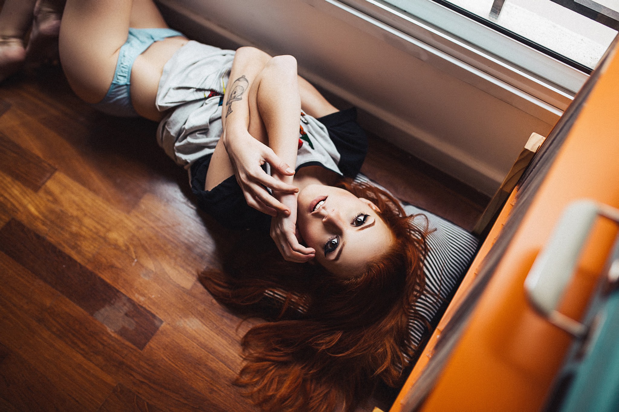 People 2048x1365 Elisa Rios women redhead lingerie thong wooden surface on the floor looking at viewer brunette tattoo Henrique Cesar T-shirt hair spread out