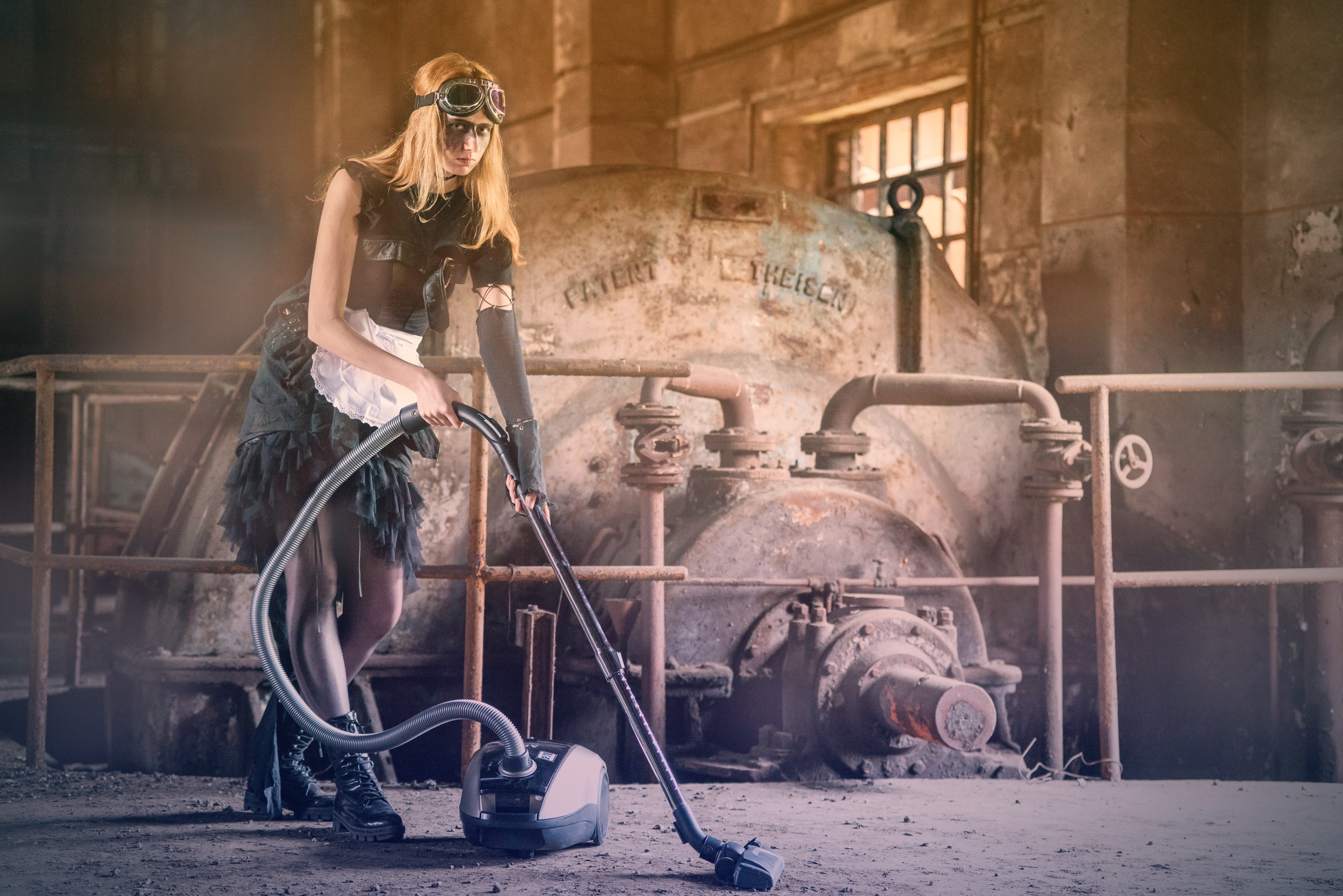 People 2500x1667 looking at viewer women model goggles maid maid outfit factories abandoned boots blonde black clothing women indoors indoors vacuum cleaner