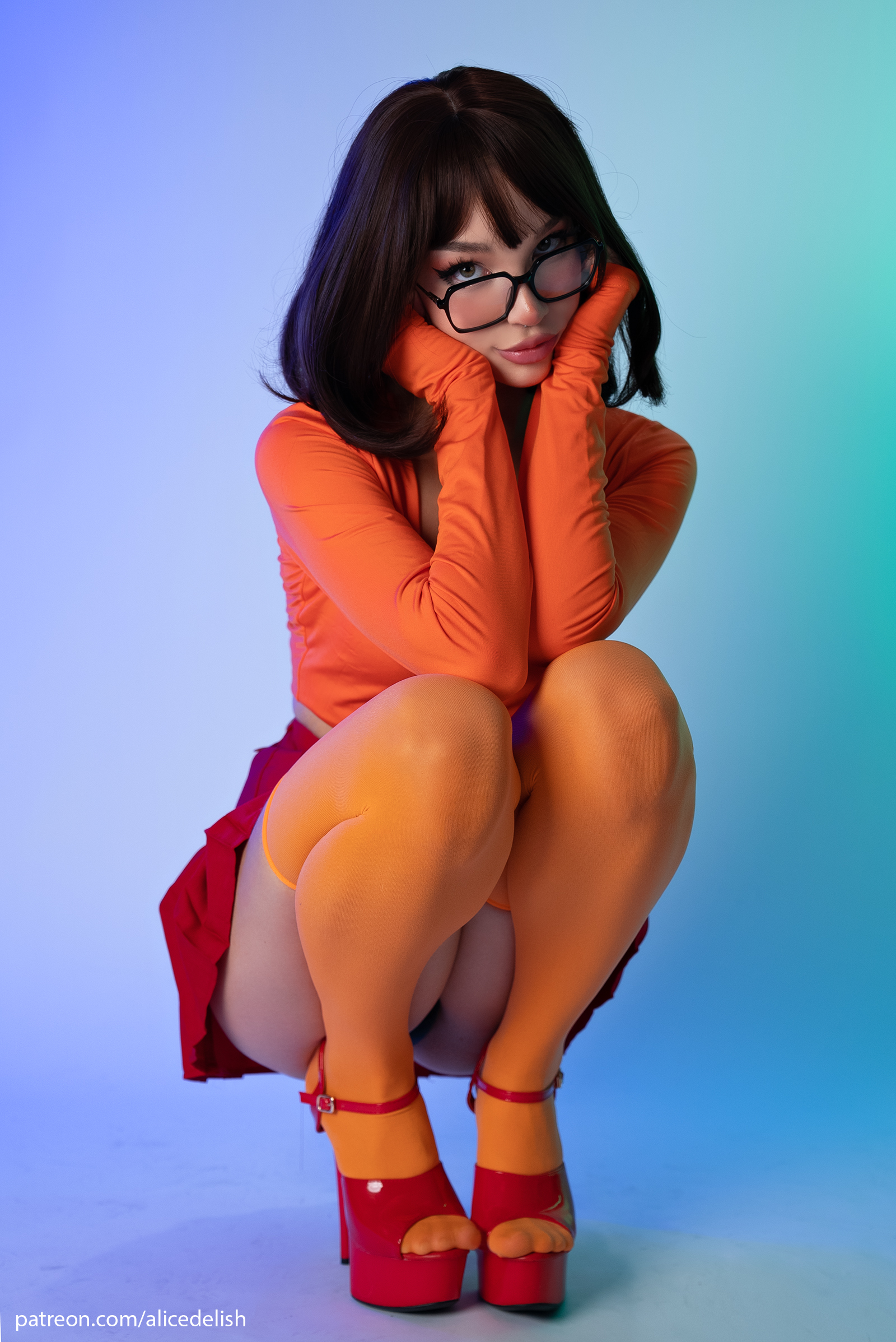 People 1600x2395 Alice Delish women model cosplay Velma Dinkley Scooby-Doo women indoors studio stockings upskirt underwear panties squatting looking at viewer high heels heels