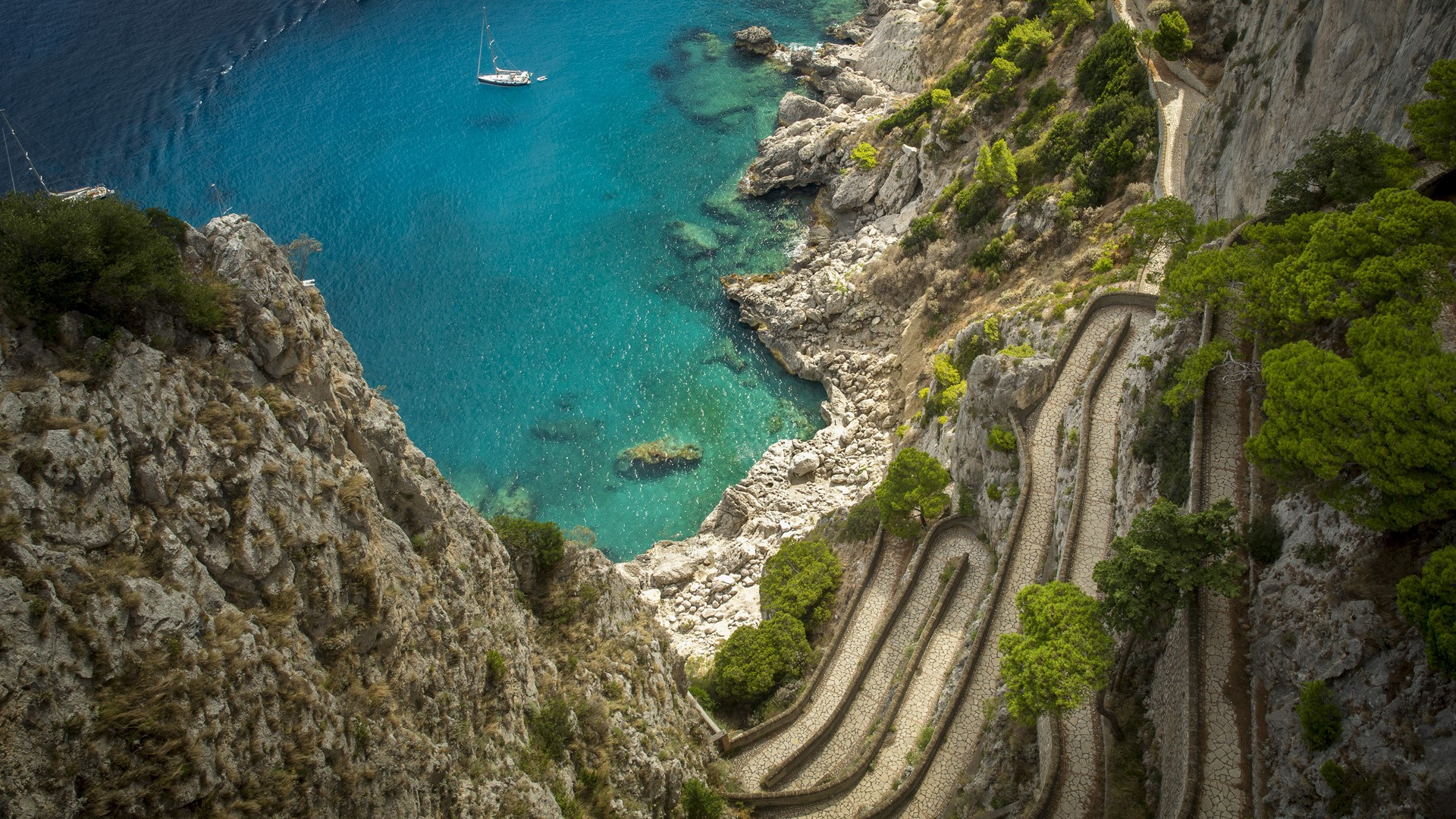 General 1920x1080 nature landscape water hairpin turns rocks coast trees boat sailboats path water ripples limestone Italy
