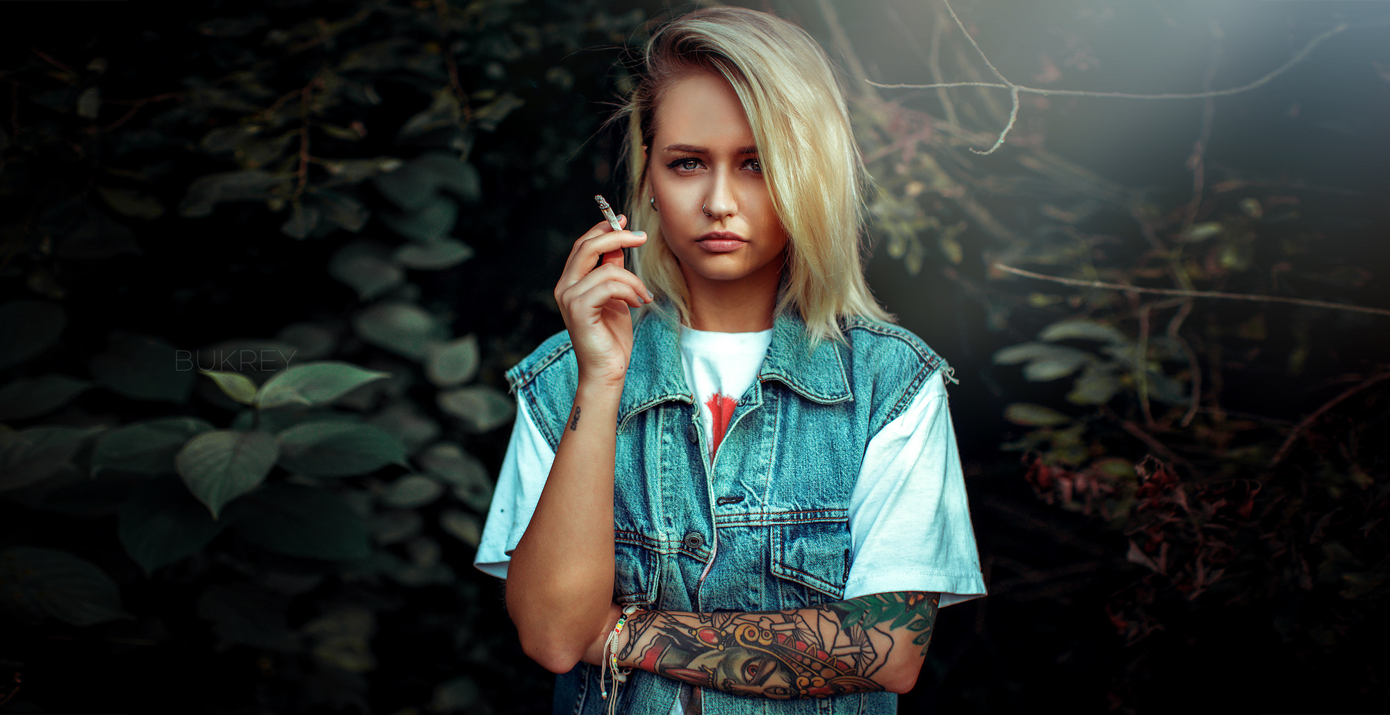 People 2000x1029 women blonde inked girls denim portrait cigarettes T-shirt nose ring smoking tattoo piercing