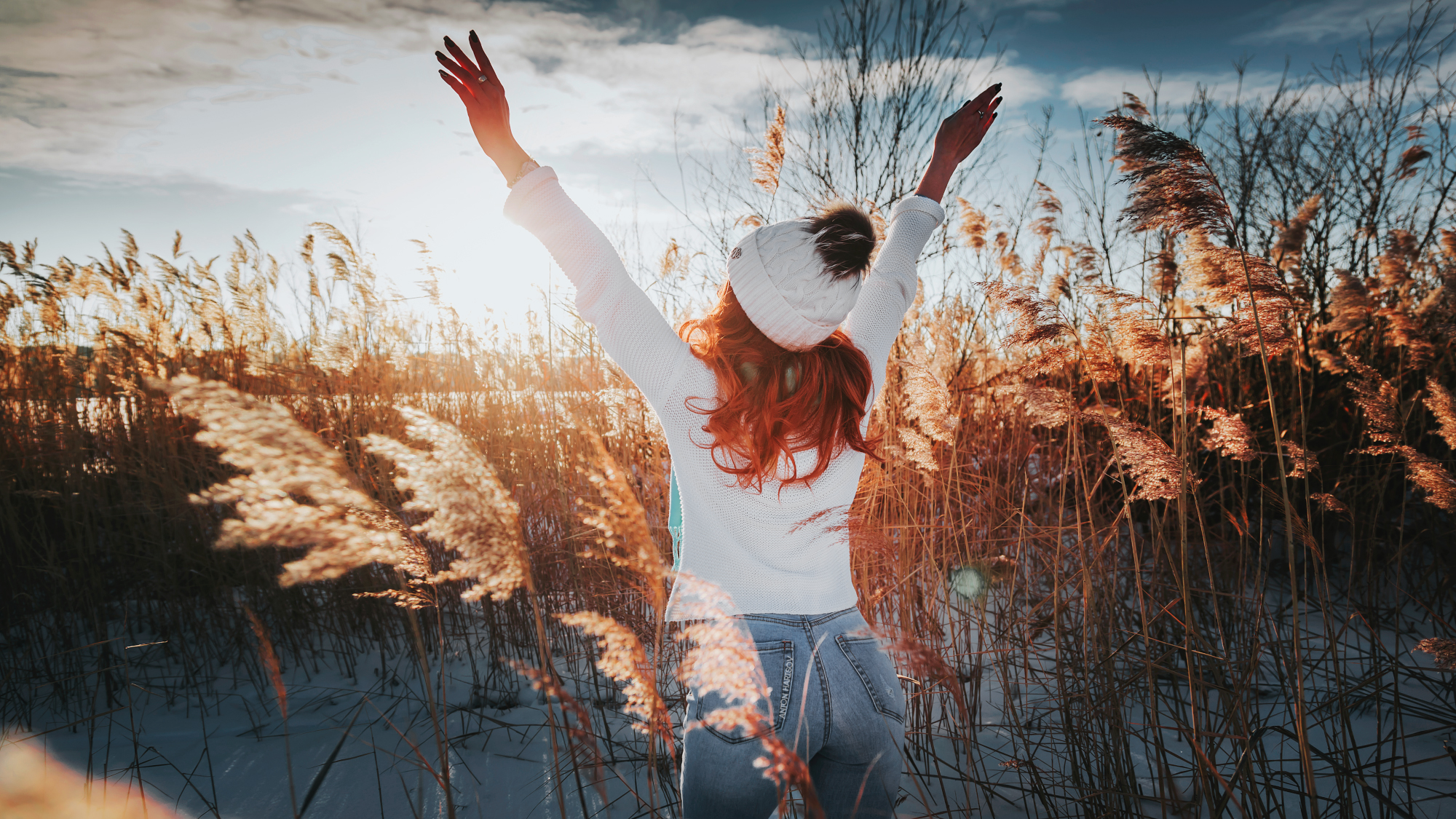 People 2000x1125 women model redhead portrait back woolly hat sweater jeans arms up outdoors winter snow sky sunset clouds women outdoors Anton Harisov