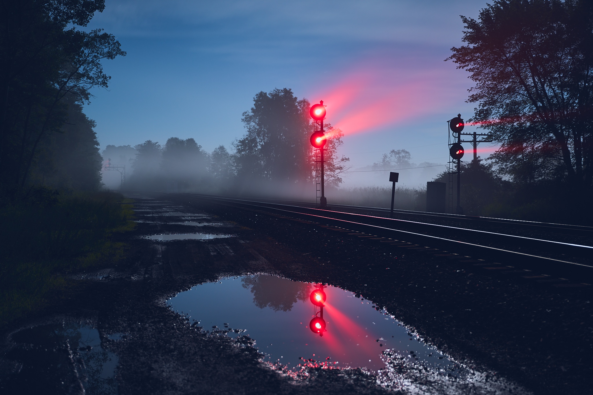 General 2048x1365 outdoors reflection railway night puddle mist dirt road