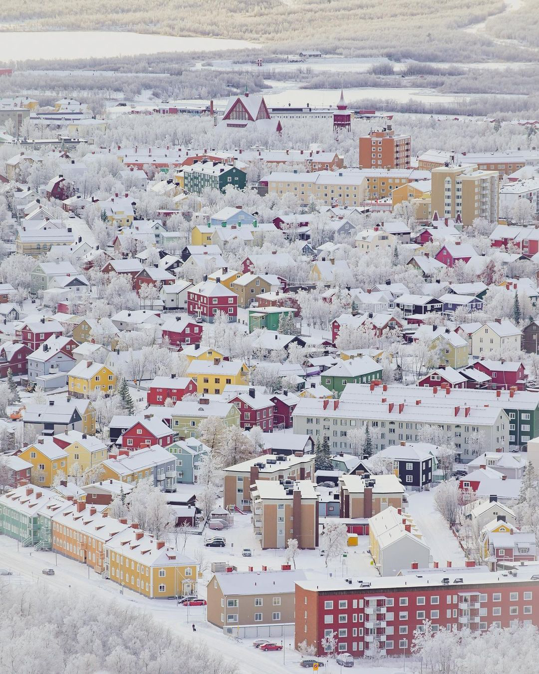 General 1080x1350 architecture building portrait display house cityscape winter snow Sweden town aerial view nature forest colorful city