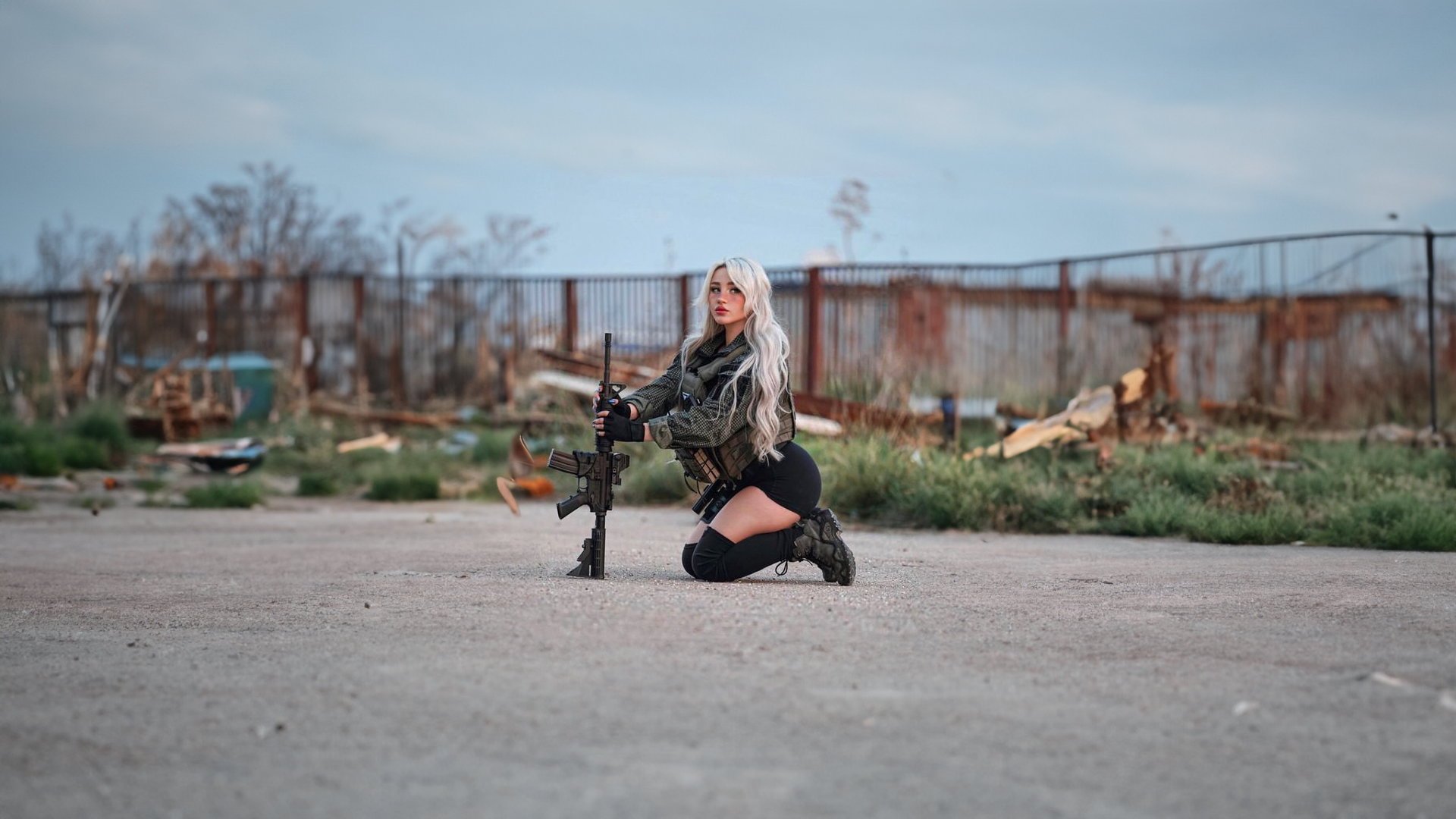 People 1920x1080 women weapon ground Natalia Fadeev gun girls with guns looking at viewer long hair blurred blurry background