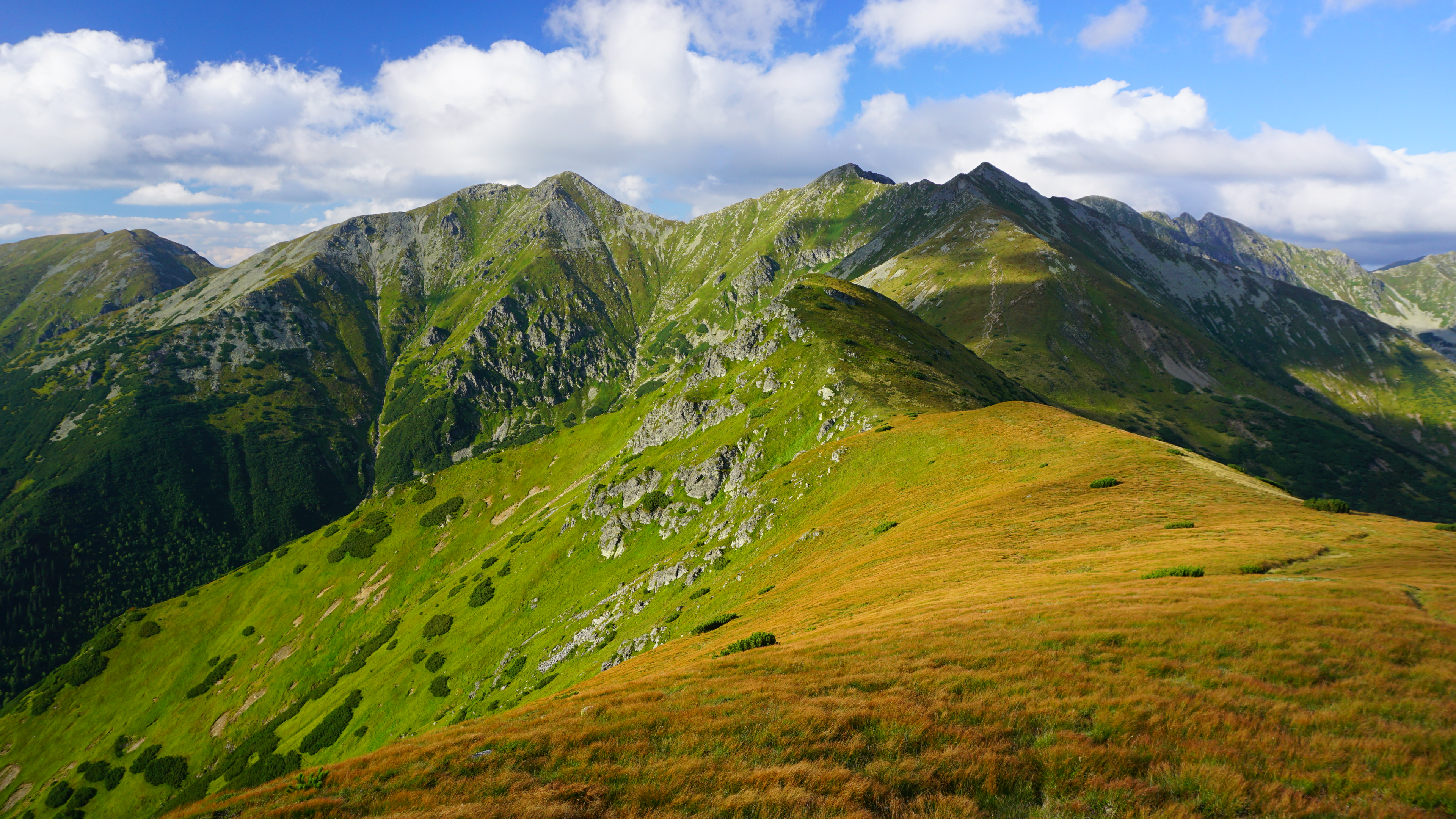 General 3840x2160 nature landscape mountains grass rocks sky clouds sunlight field