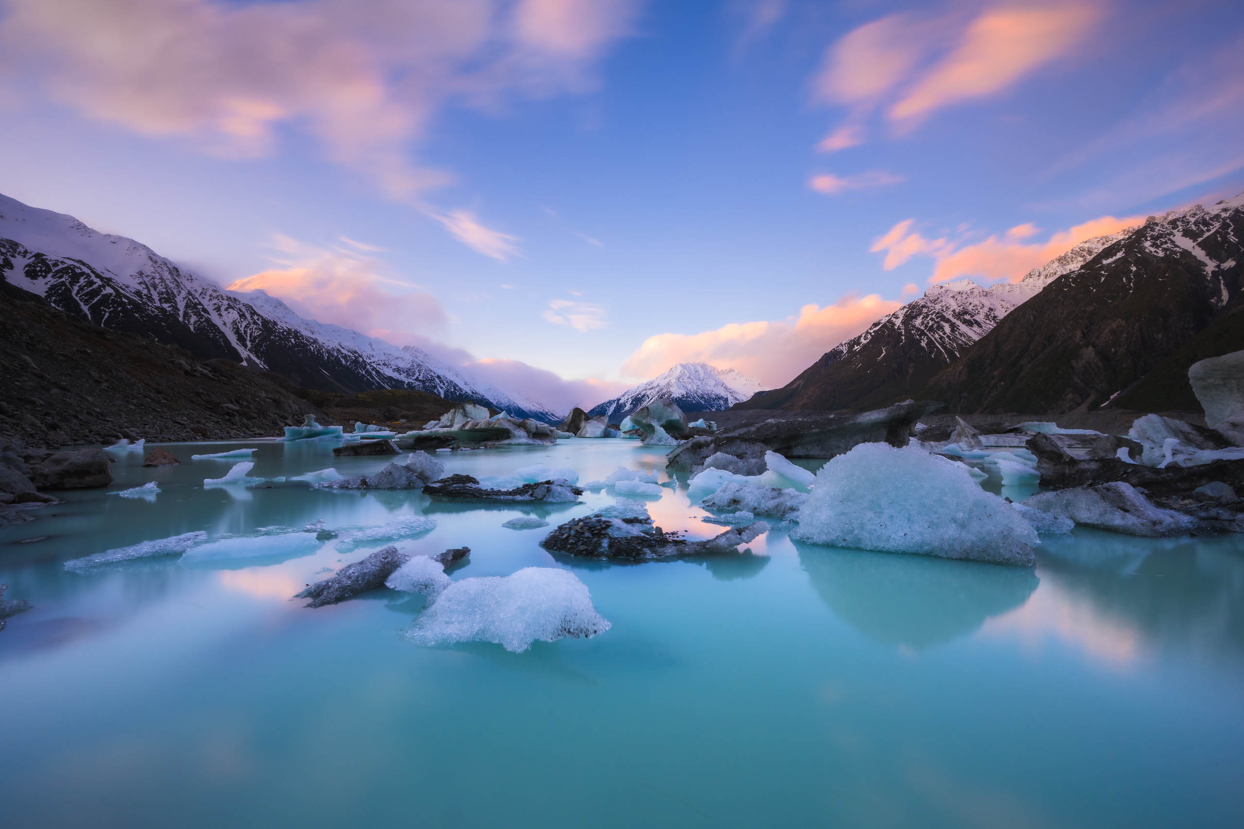 General 2560x1707 photography Joshua Cripps landscape depth of field reflection New Zealand outdoors blue nature sky sunset ice stones environment rocks winter cold sunrise snowy mountain mountains skyscape