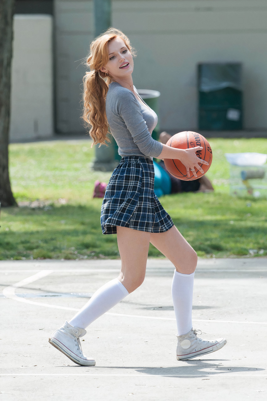 People 853x1280 Bella Thorne women actress legs miniskirt basketball movies redhead sneakers knee high socks long hair women outdoors portrait display