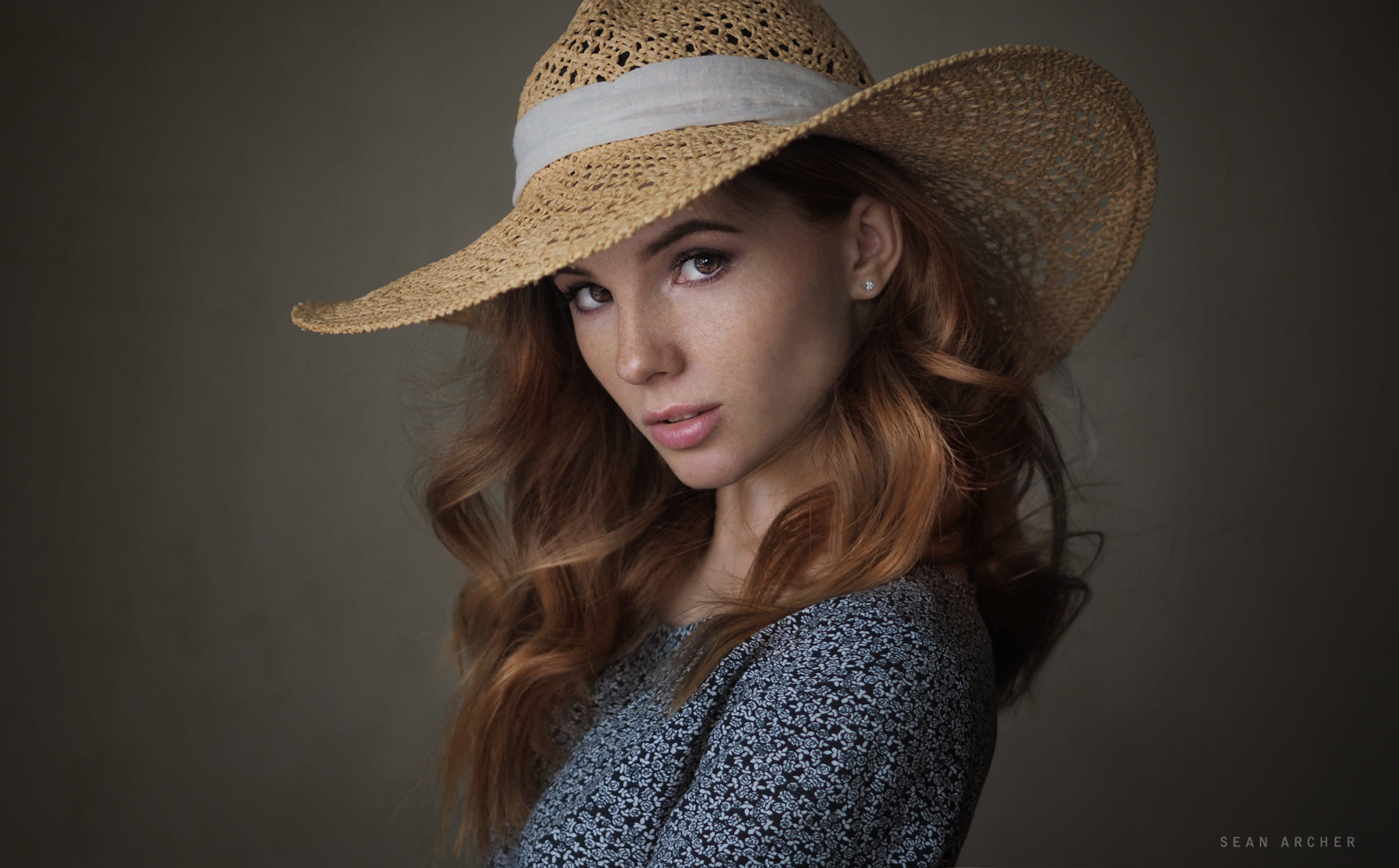 People 1900x1179 women redhead hat simple background face long hair freckles hazel eyes portrait Sean Archer women with hats Anna Fedotova watermarked