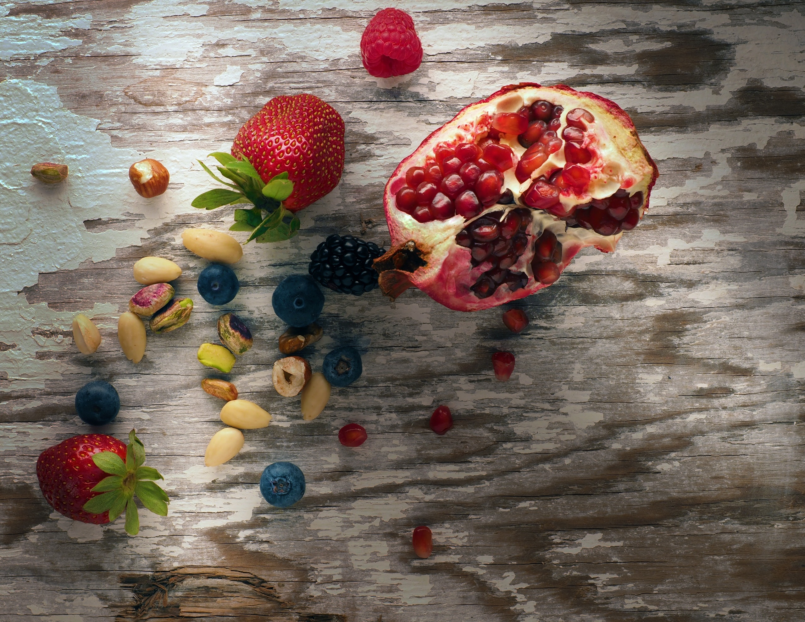General 2560x1981 food fruit berries strawberries blueberries pomegranate top view wooden surface
