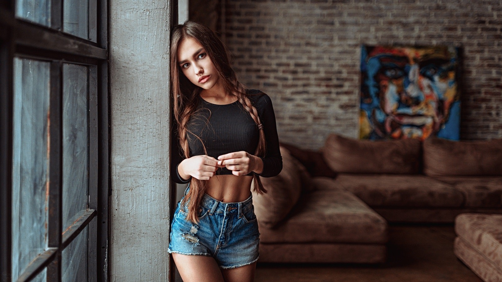 People 1600x900 women model long hair looking at viewer auburn hair braids jean shorts short tops belly women indoors depth of field portrait twintails window couch tanned wall bricks Georgy Chernyadyev high waisted shorts petite juicy lips bare midriff sensual gaze Anastasia Lis