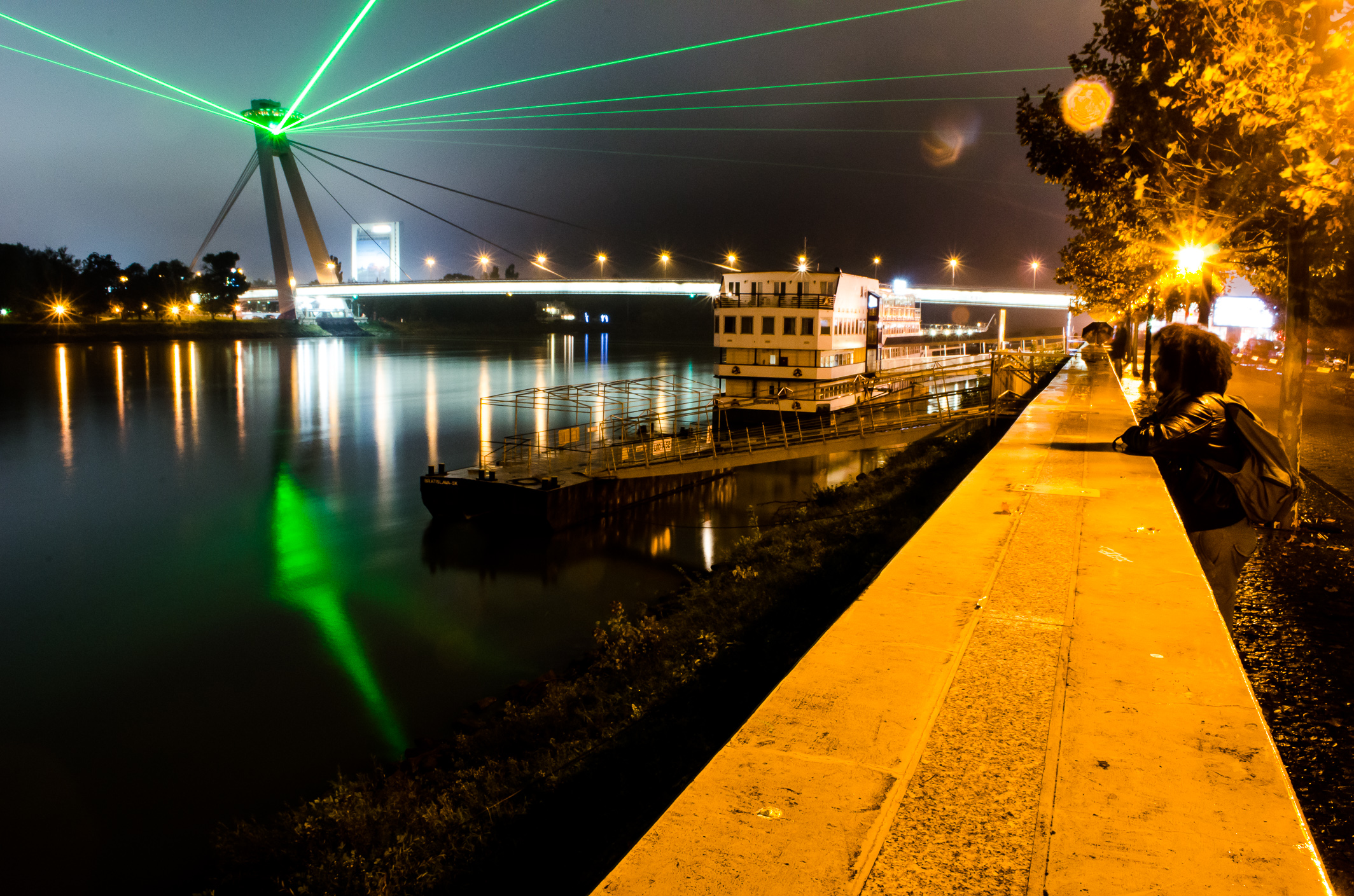 General 2128x1409 Bratislava Slovakia city night lights architecture bridge river Danube ship people reflection lens flare trees
