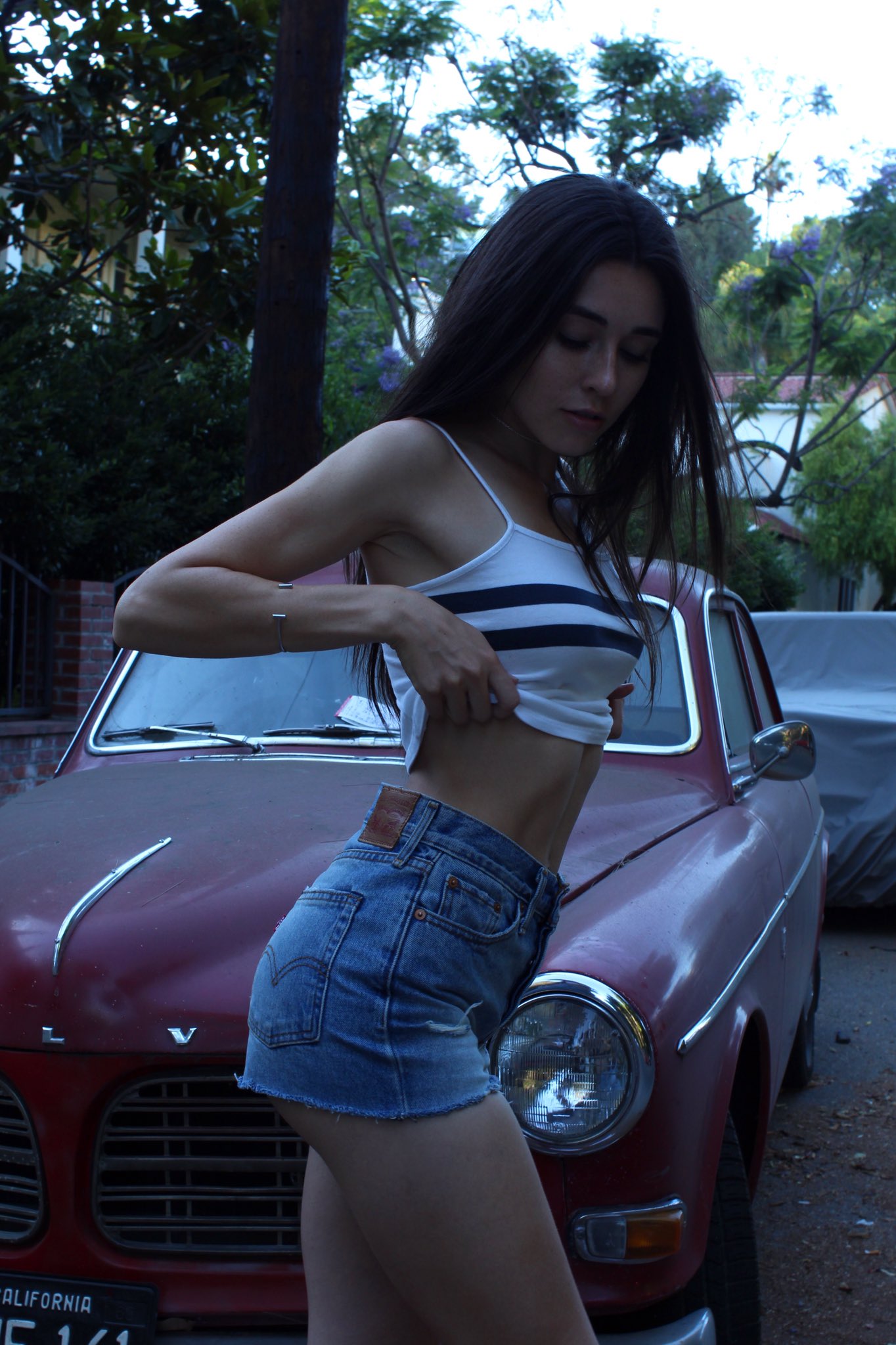 People 1364x2048 Audrey Bradford model jean shorts Volvo white tops high waisted shorts side view women car women with cars Swedish cars