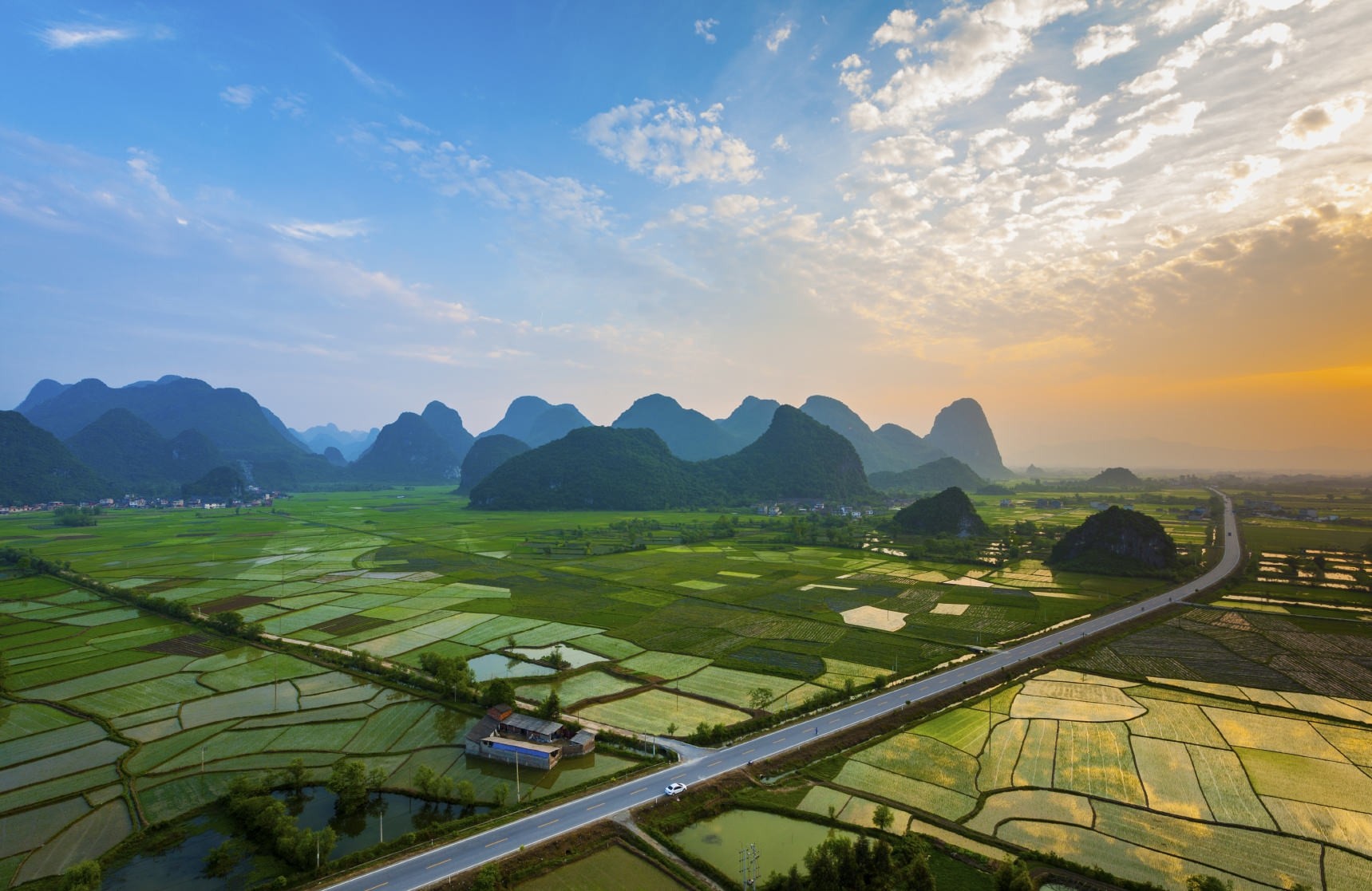 General 1719x1117 landscape photography field mountains sunset road clouds village Guilin China rice fields Agro (Plants) sky Asia