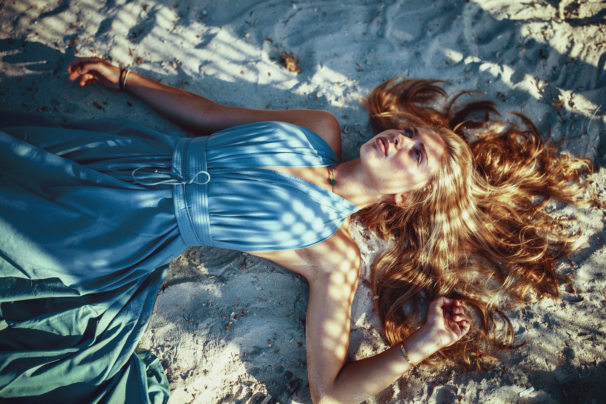 People 2048x1366 women redhead blue dress lying on back sand Arnaud Moro no bra