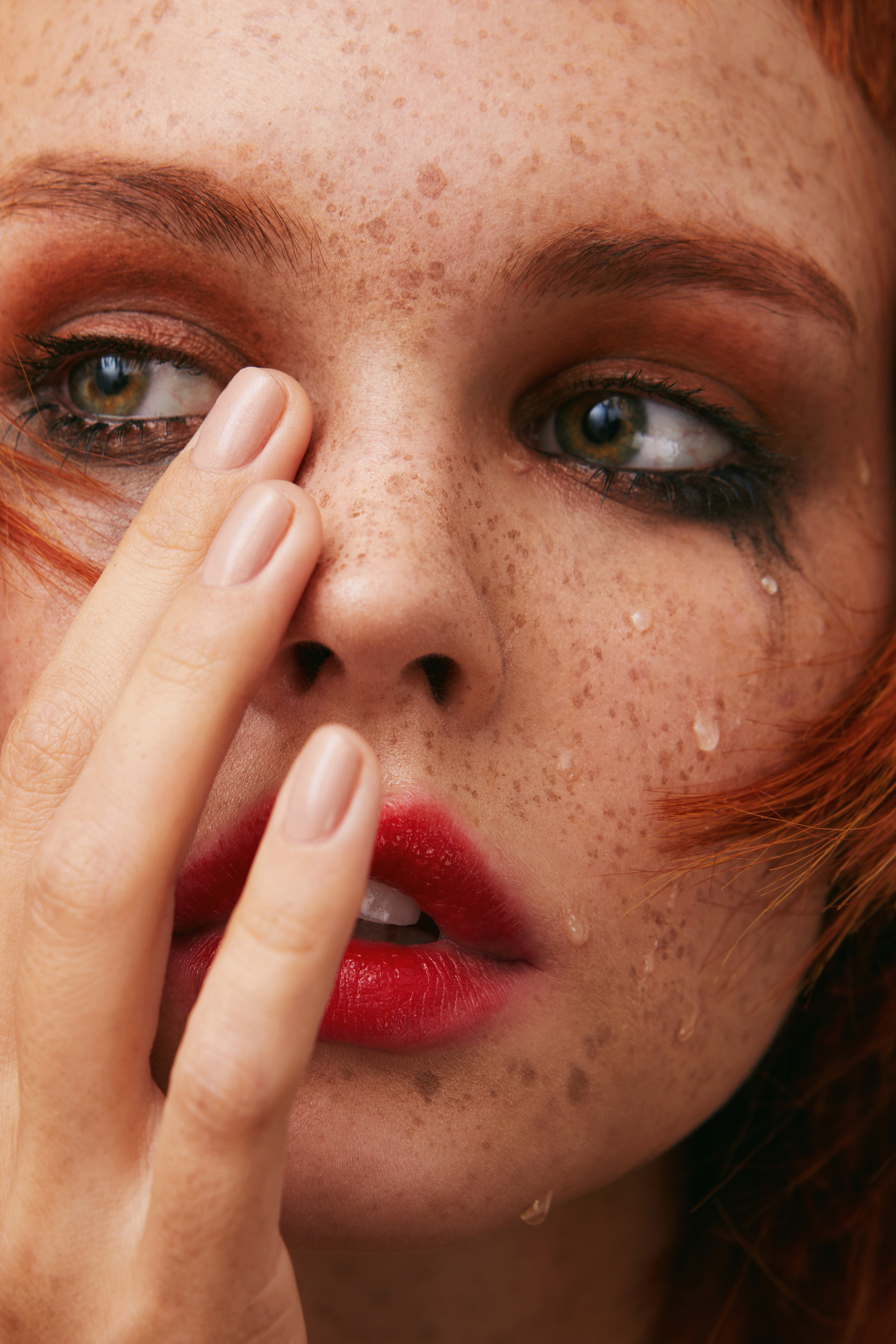 People 2800x4200 freckles women tears red lipstick eyes closeup Anastasia Scheglova sad crying looking away face makeup lipstick hand on face portrait