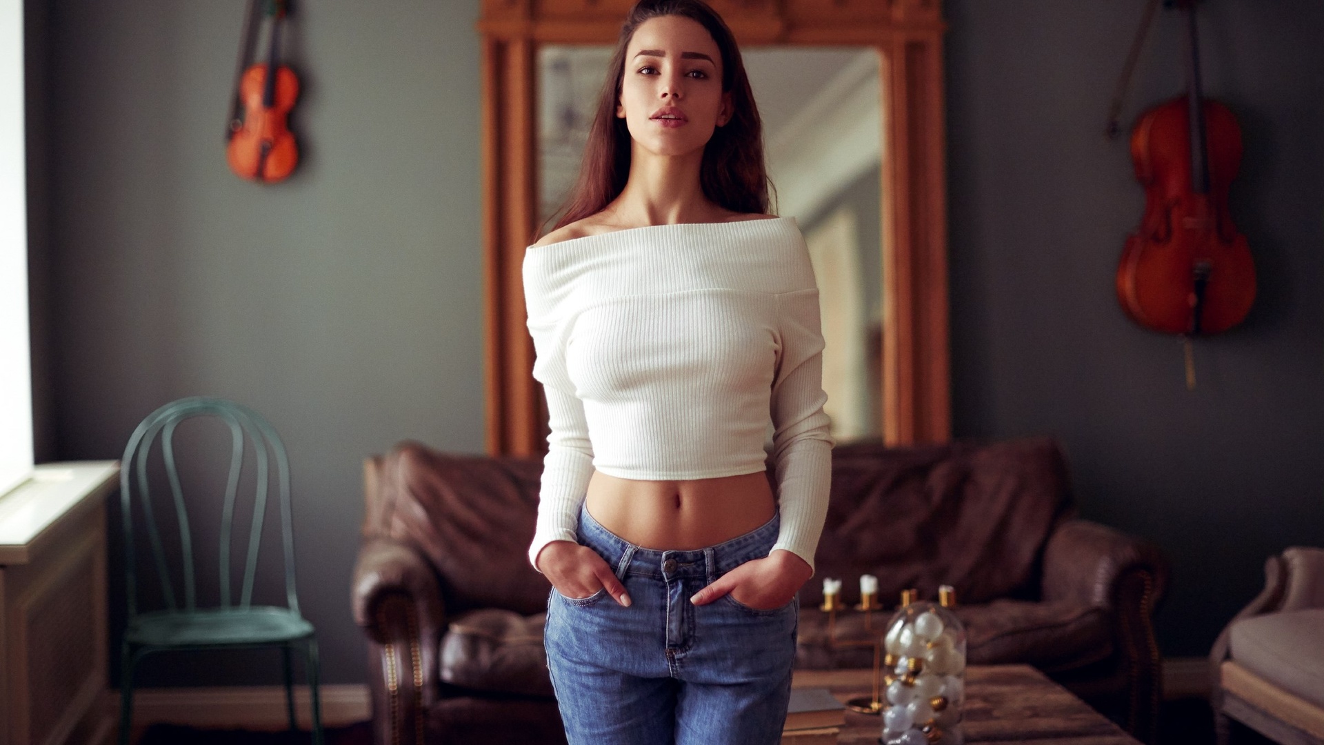 People 1920x1080 women model brunette long hair women indoors jeans short tops violin hands in pockets belly couch chair table bare shoulders blue pants blue  jeans