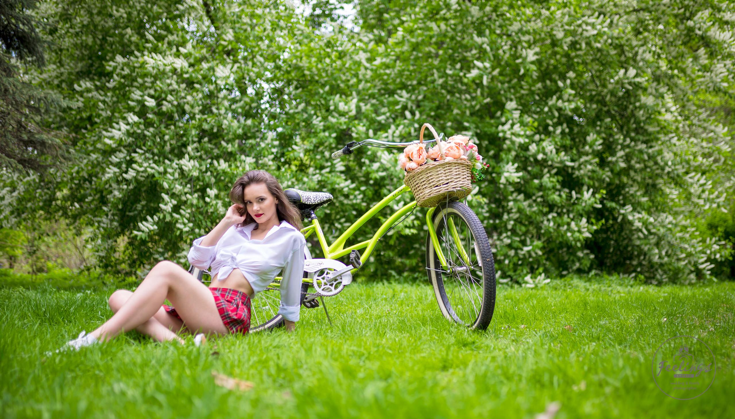 People 2560x1459 women plaid skirt white shirt school uniform flowers women outdoors women with bicycles bicycle sitting grass red lipstick sneakers smiling skirt white socks