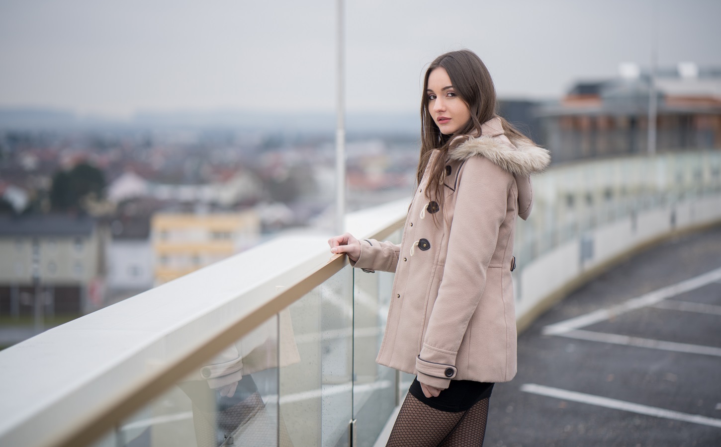 People 1450x900 women model brunette looking at viewer women outdoors jacket white jacket standing looking over shoulder long hair fishnet stockings urban classy Caucasian balcony pale makeup parted lips