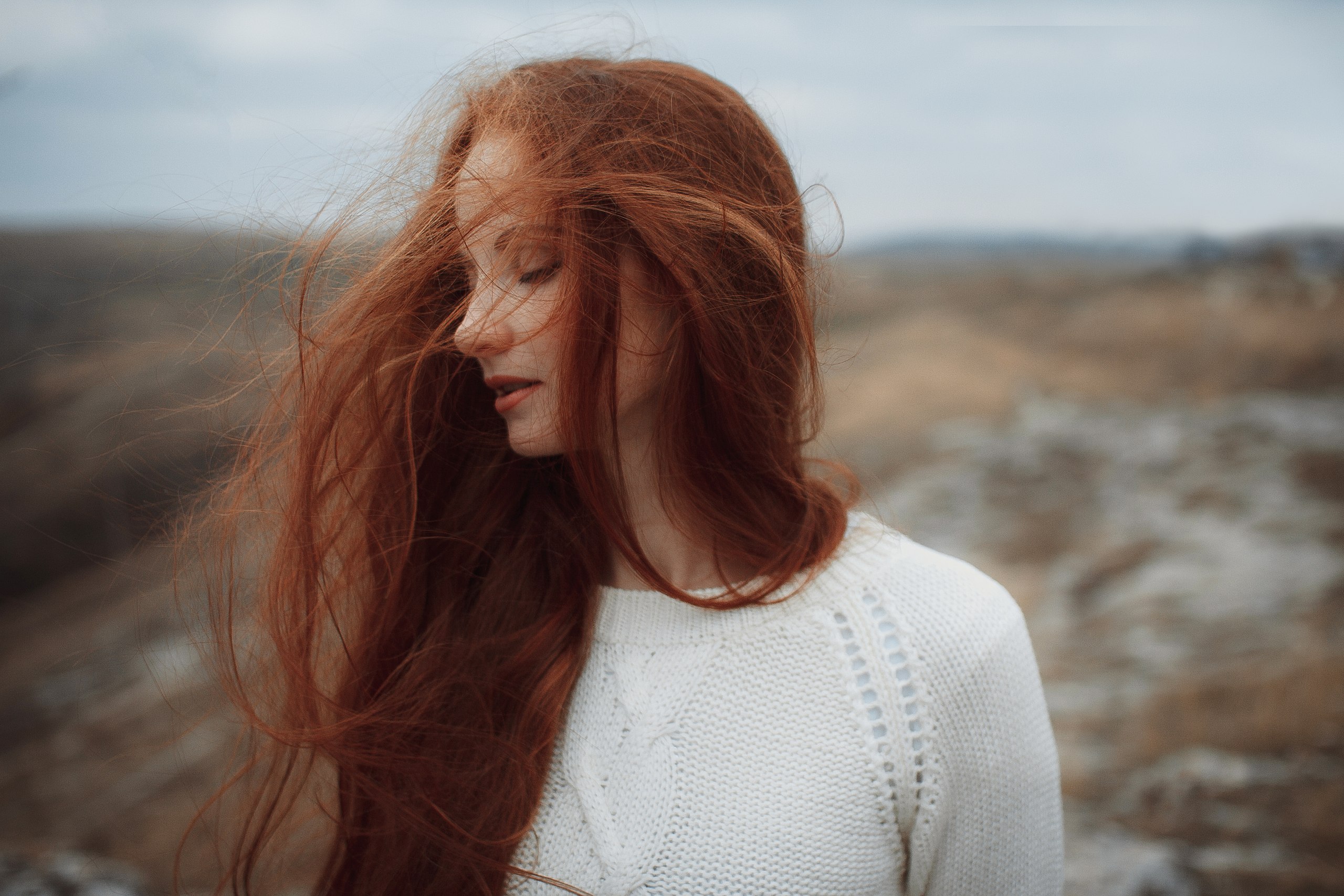 People 2560x1707 women model redhead long hair hair in face portrait sweater white sweater closed eyes depth of field women outdoors profile windy outdoors