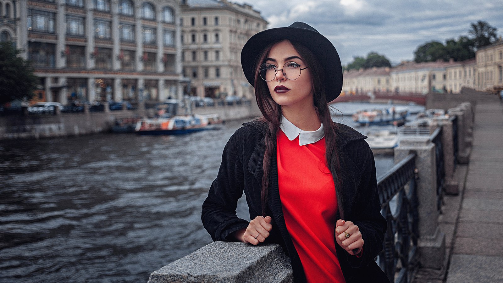 People 1600x900 women model brunette women outdoors water pierced septum black hat rings black jackets glasses pierced nose makeup red dress collar blurred blurry background looking into the distance St. Petersburg Russia river women with glasses building waves women with hats hat coats portrait sky clouds
