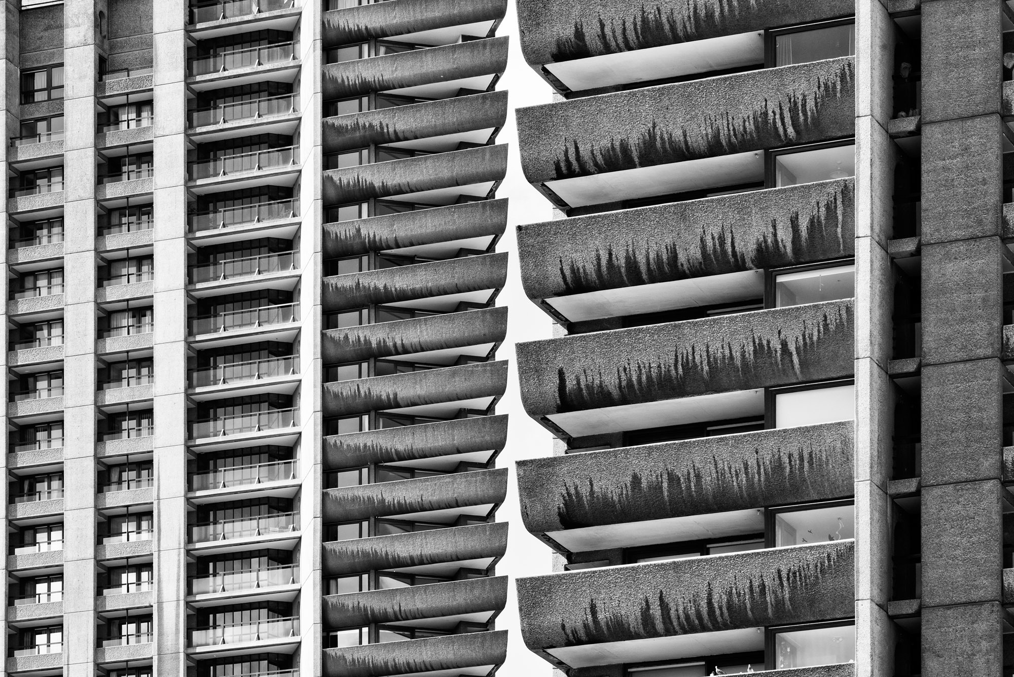 General 2000x1335 architecture building block of flats Brutalism Barbican London UK monochrome balcony lines concrete window