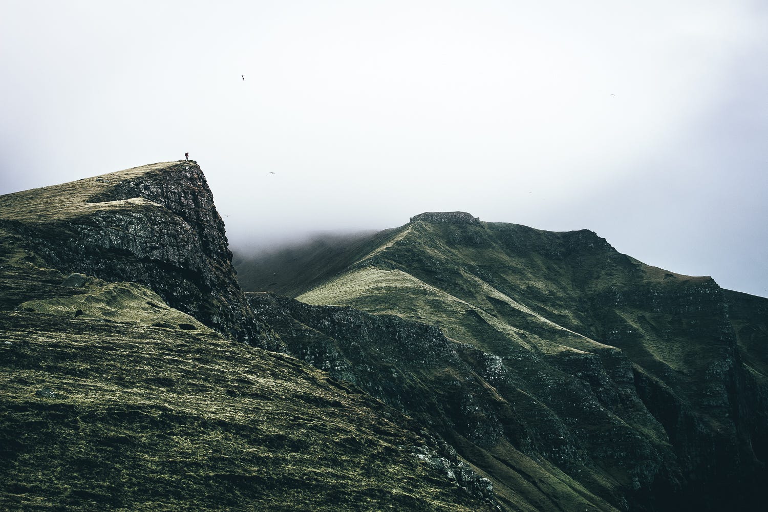 General 1500x1000 mountains clouds mist alone rain storm Faroe Islands hiking overcast cliff Denmark