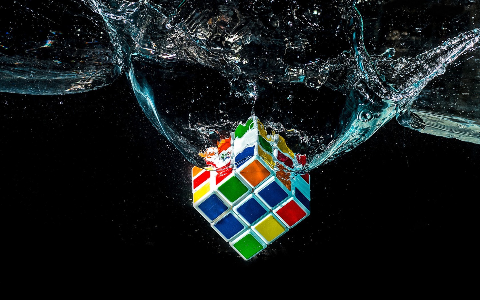 General 1680x1050 water digital art Rubik's Cube splashes in water black 3D blocks CGI