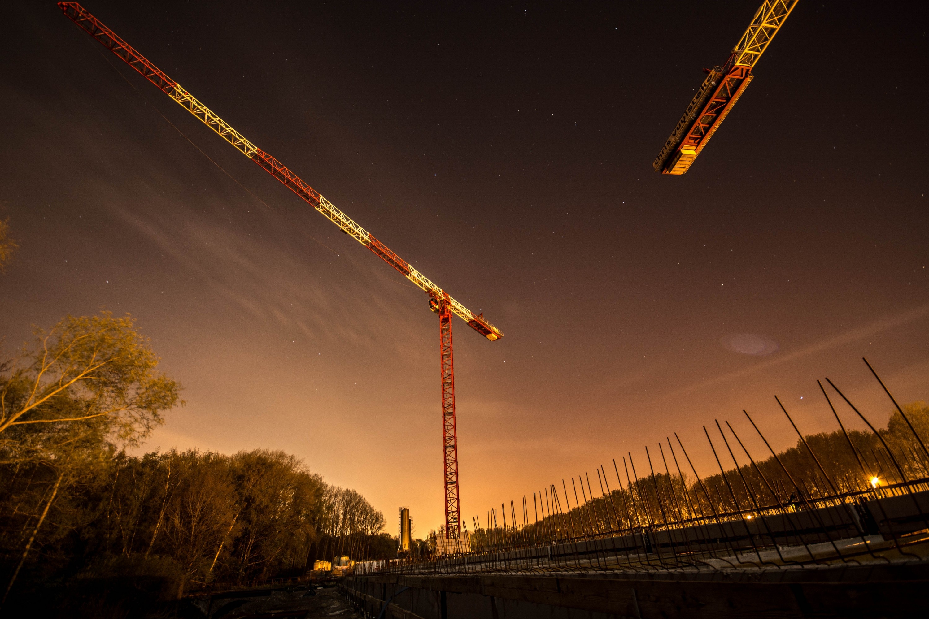 General 3000x2000 clouds trees cranes (machine) low light outdoors construction site