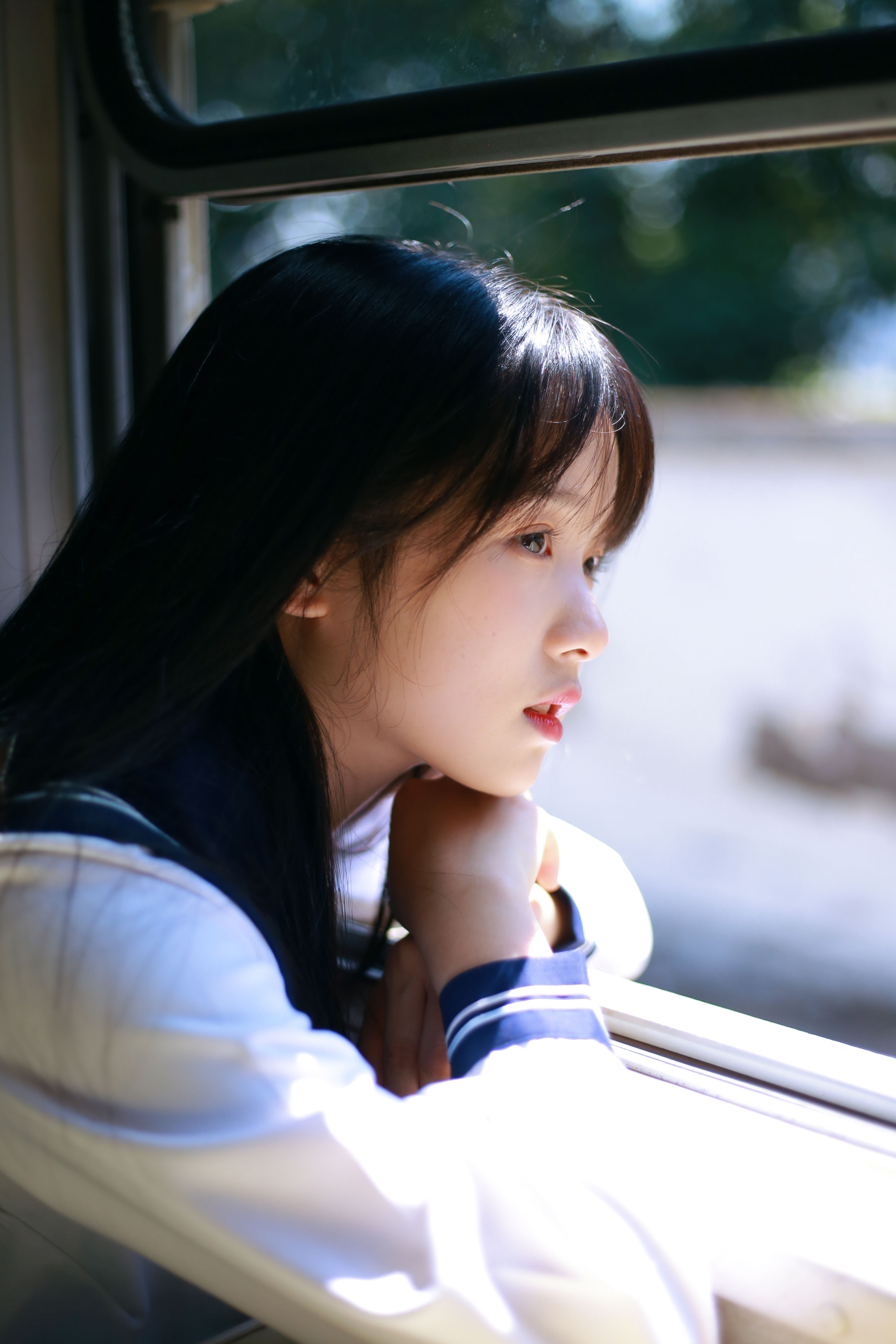 Asian, women, looking out window, dark hair, face, profile, parted lips ...