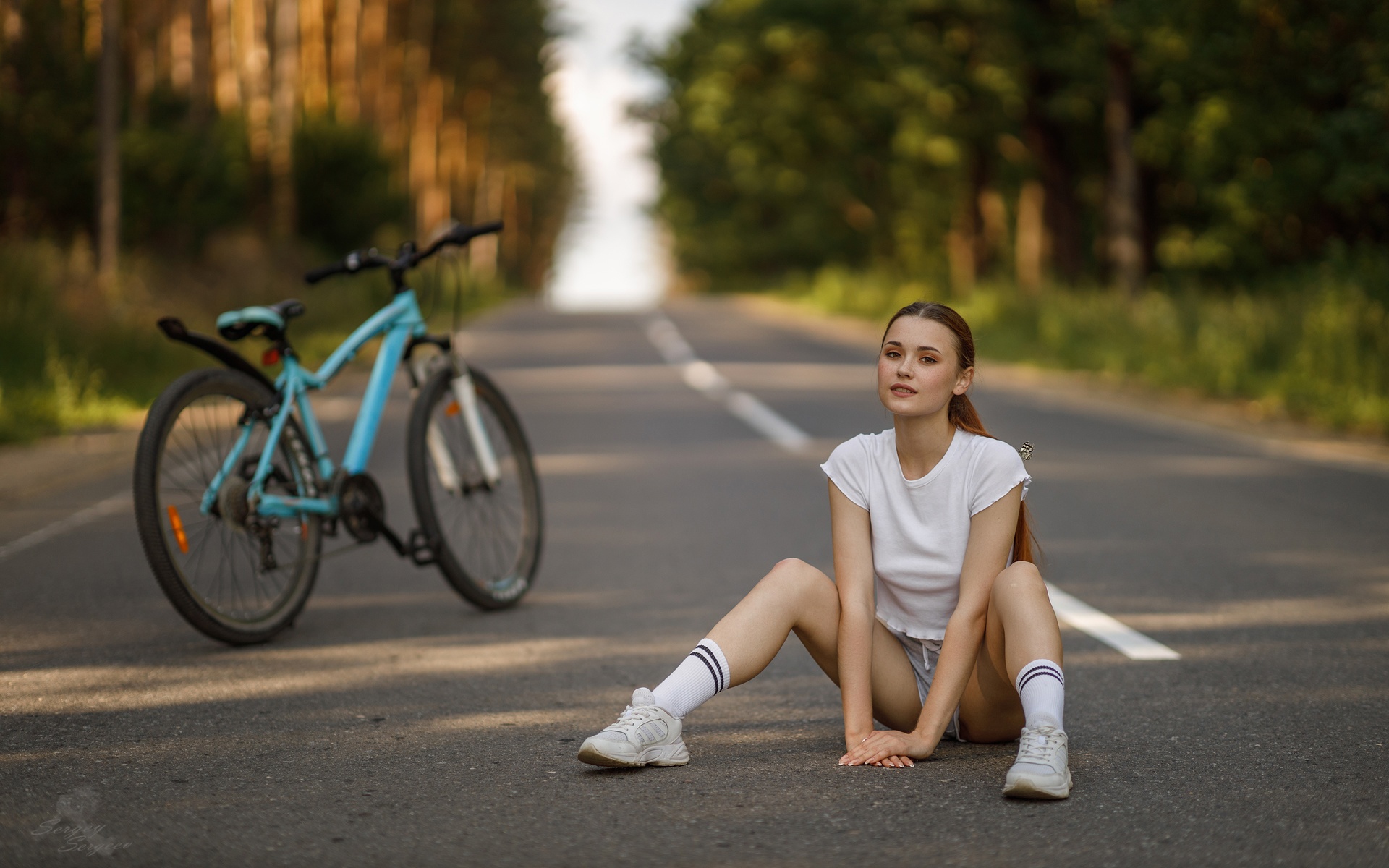 People 1920x1200 Sergey Sergeev Nadezhda Tretyakova women outdoors road trees redhead women model bicycle nature short tops short shorts shorts sneakers butterfly T-shirt white tops M legs white sneakers whole body hand(s) between legs socks