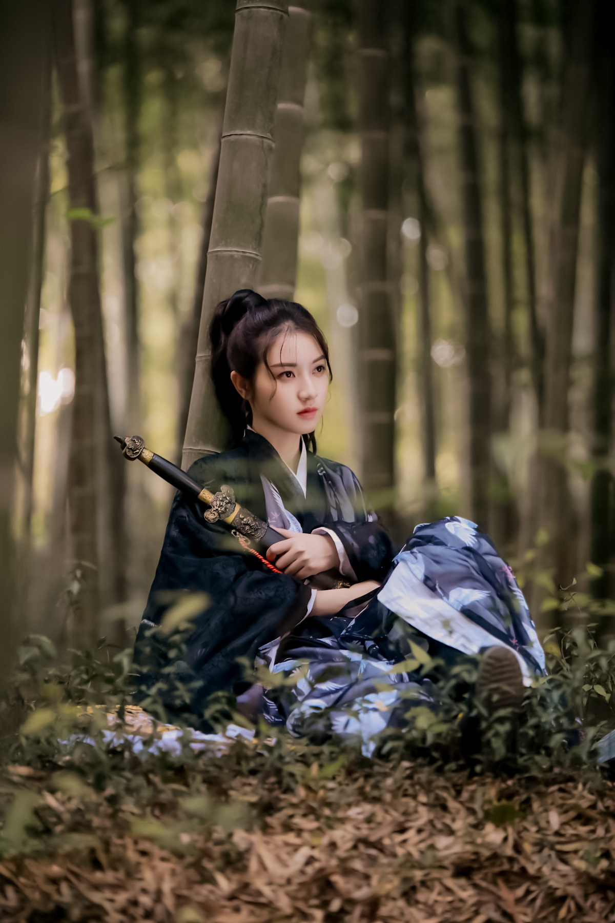 People 1200x1800 women model Chinese model cosplay katana brunette long hair Chinese dress tied hair hair in face bamboo forest Asian hanfu