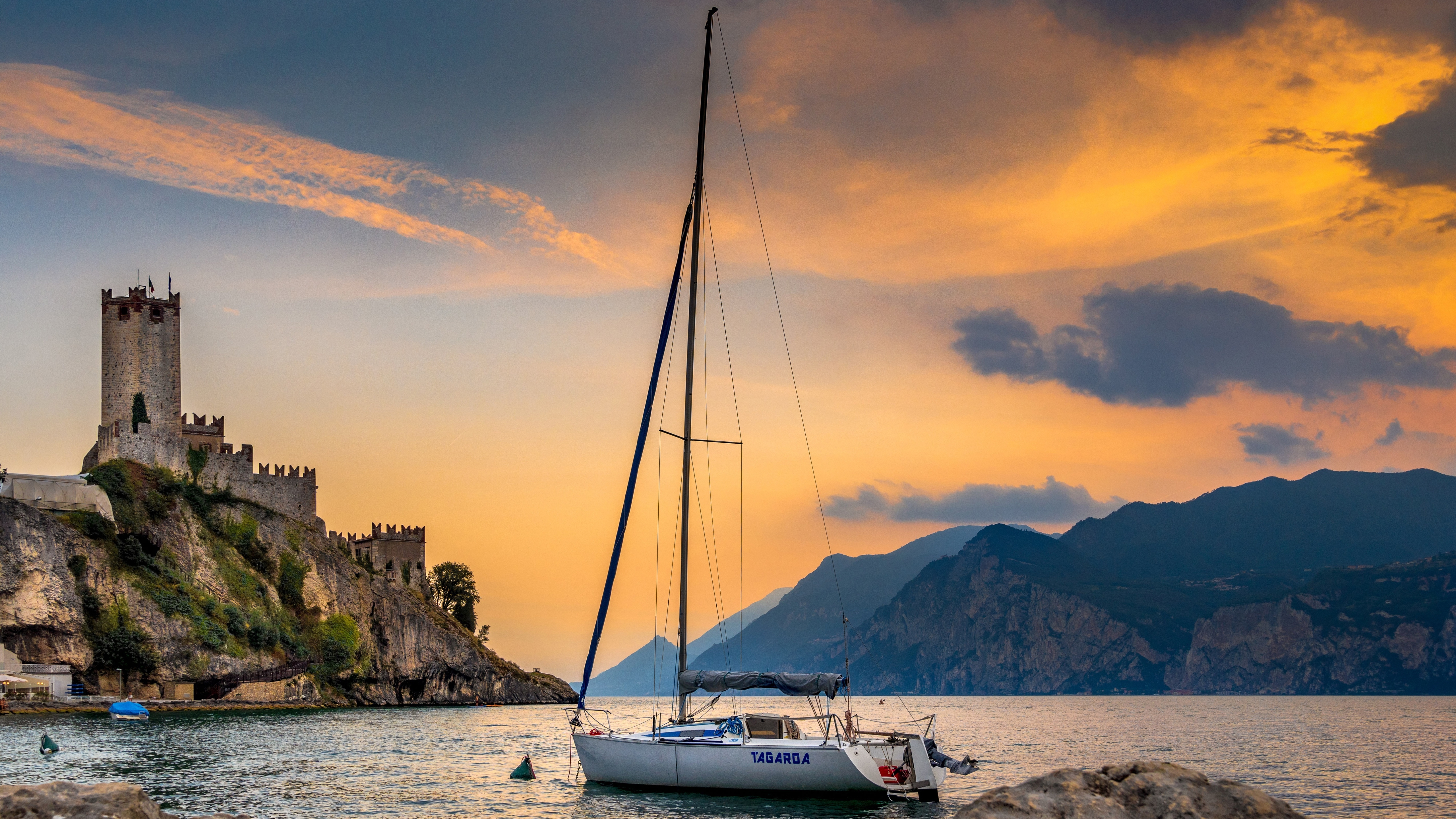 General 5120x2880 Italy lake garda boat sunset castle clouds sky water