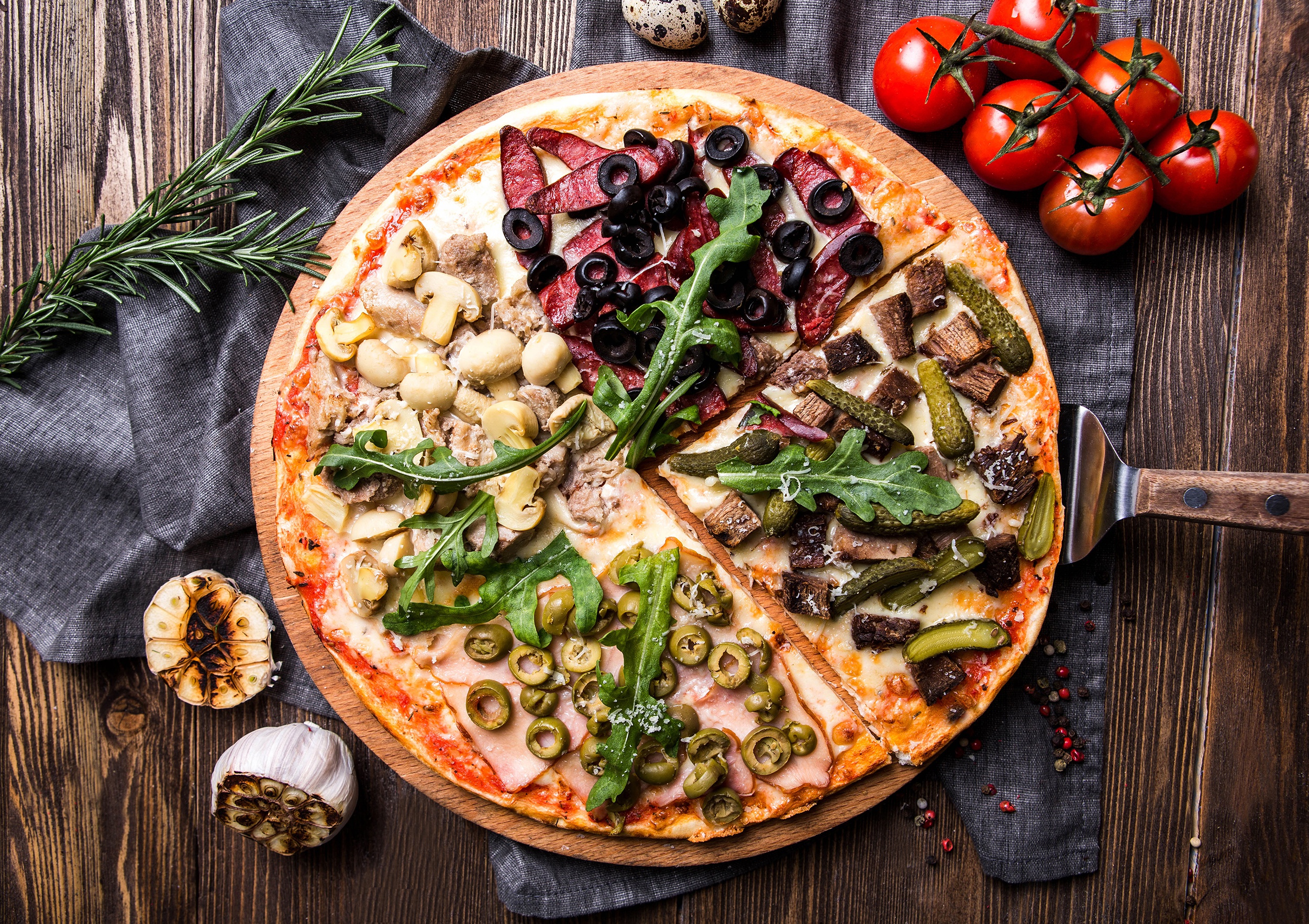 General 2500x1765 food pizza tomatoes Garlic mushroom olives pickles rosemary napkin wooden surface