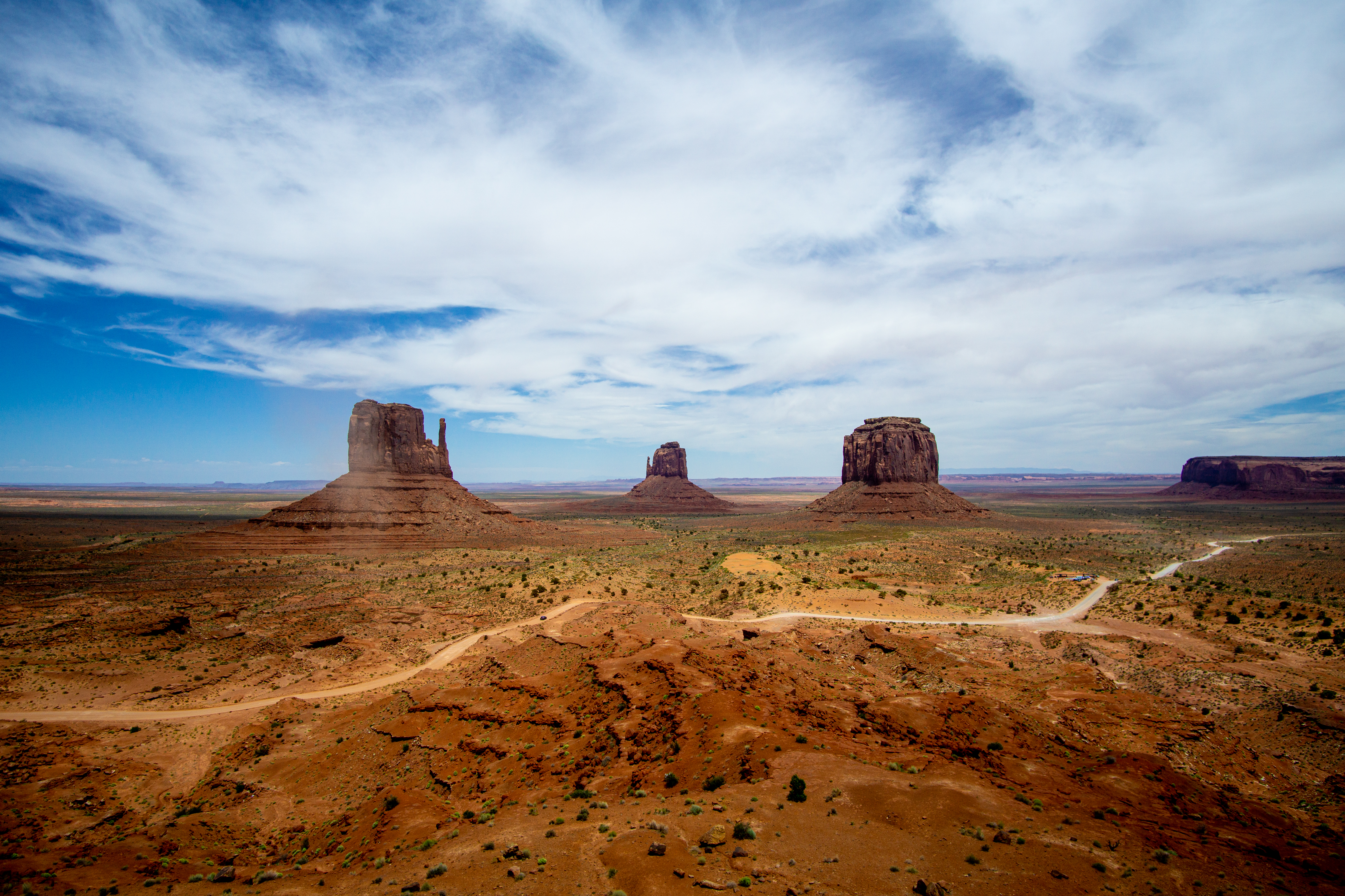 General 5930x3953 landscape desert road brown red clouds Monument Valley