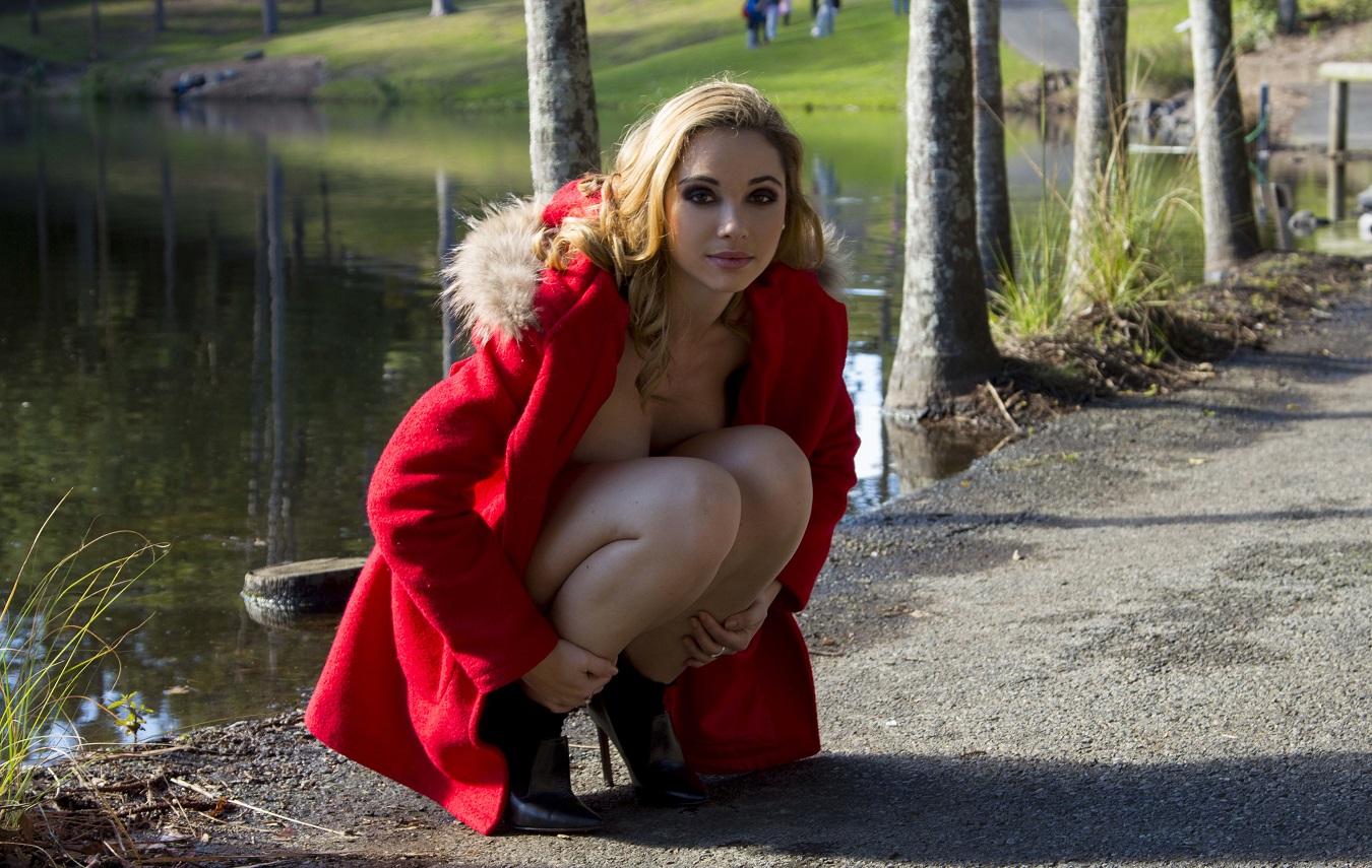 People 1350x855 Kimberly women women outdoors blonde squatting red coat makeup partially clothed holding leg(s) Nude-Muse David Entz strategic covering coats model park
