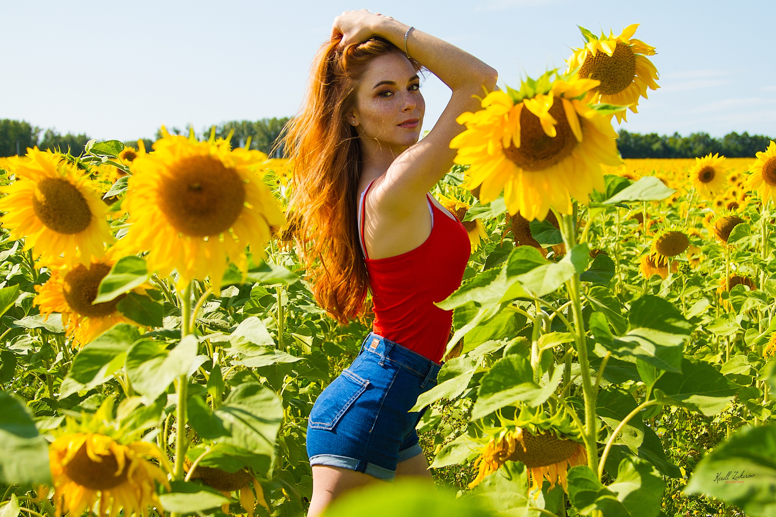 People 2560x1707 Kirill Zakirov women model redhead tank top holding hair sunflowers flowers outdoors jean shorts looking at viewer earring depth of field portrait women outdoors freckles smiling high waisted shorts Alina Nurieva