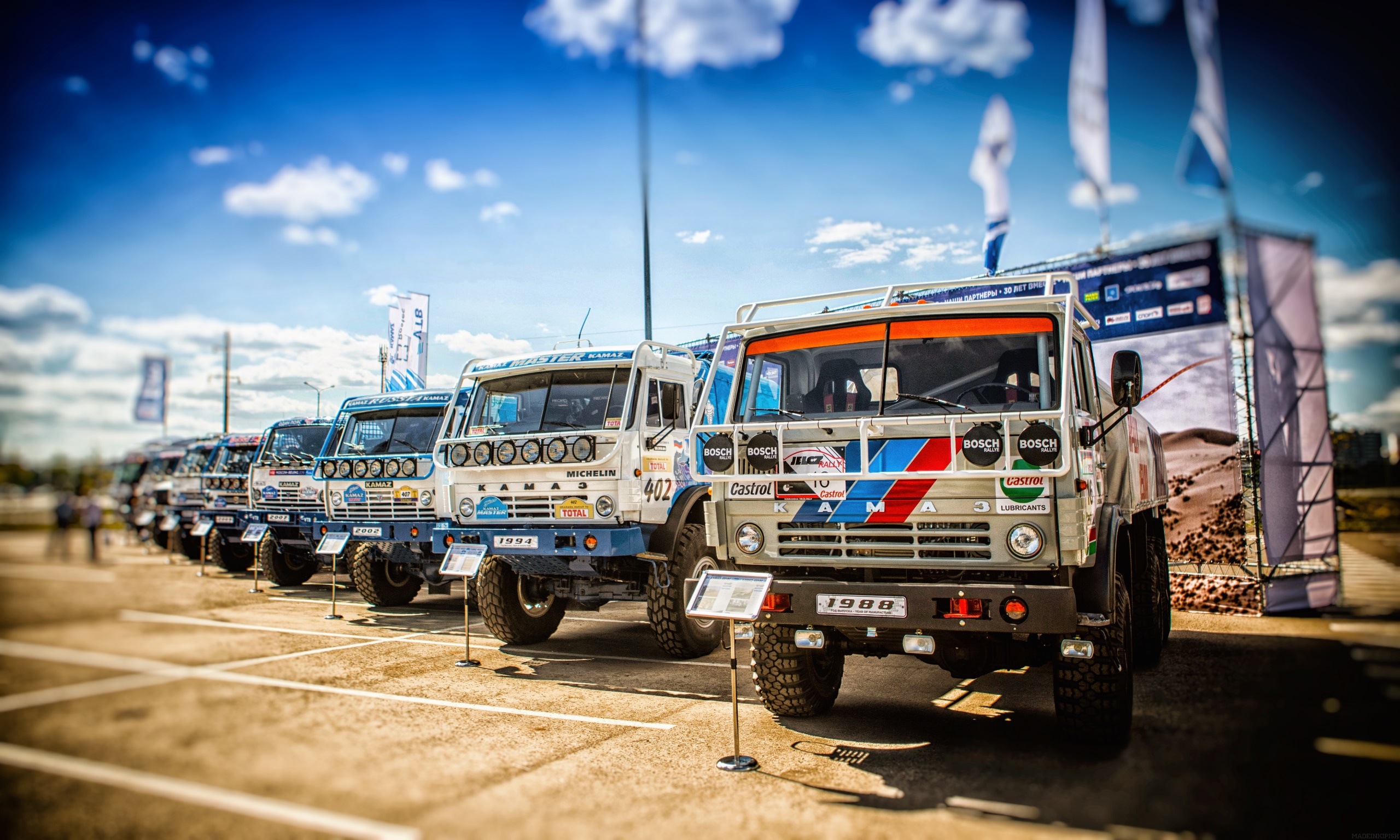 General 2560x1536 Rally truck vehicle clouds wheels Kamaz line-up Russian 1988 (year) 1994 (Year) 2002 (Year) 2007 (Year) museum history