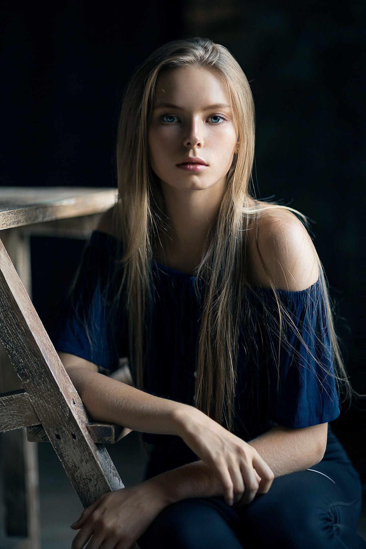 People 1280x1920 portrait display blonde women indoors face looking at viewer women depth of field blue eyes photography bare shoulders long hair sitting blue clothing young women Mikhail Mikhailov