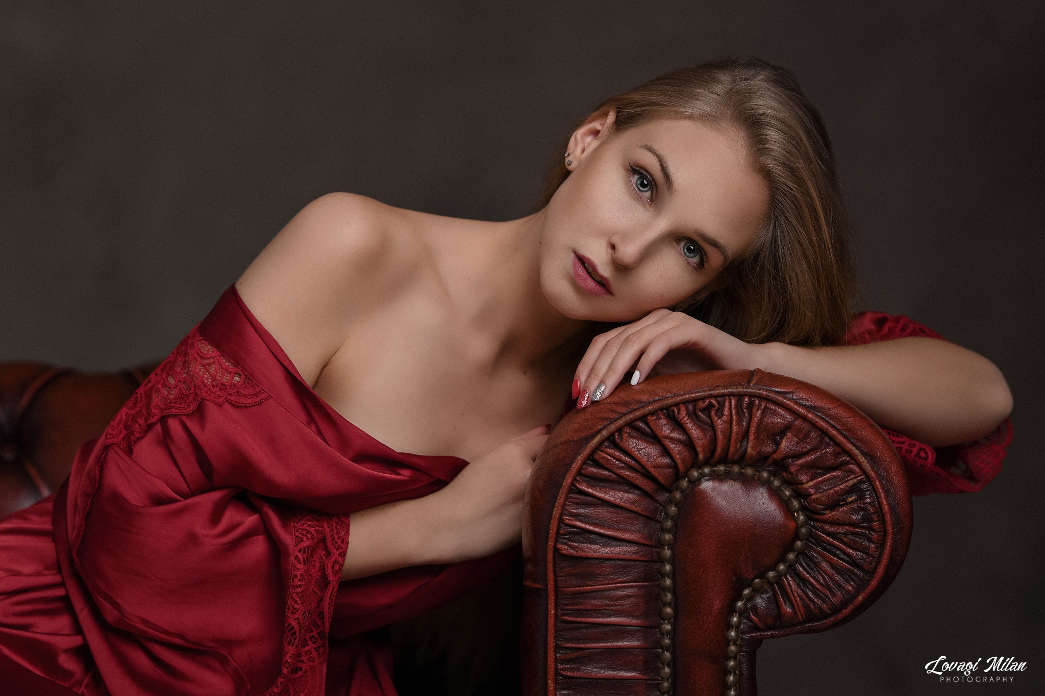 People 2048x1365 women bare shoulders portrait model women indoors Lovagi Milán gray eyes on sofa painted nails blue eyes red dress classy leather couch