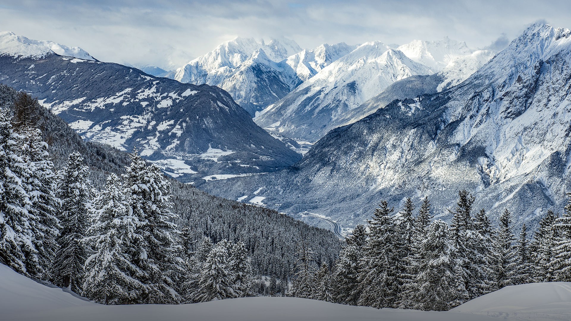 General 1920x1080 nature landscape winter mountains snowy mountain trees forest snow clouds sky rocks Tyrol Alps Italy