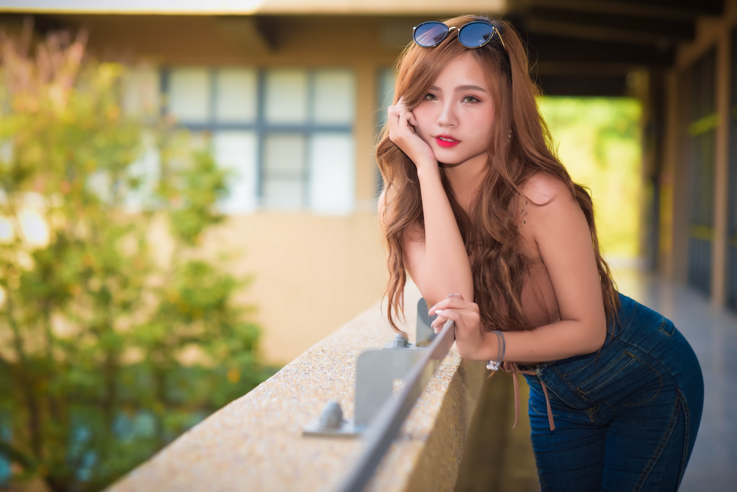 People 2560x1709 Asian women model long hair red lipstick sunglasses blurred women with shades brunette jeans women outdoors