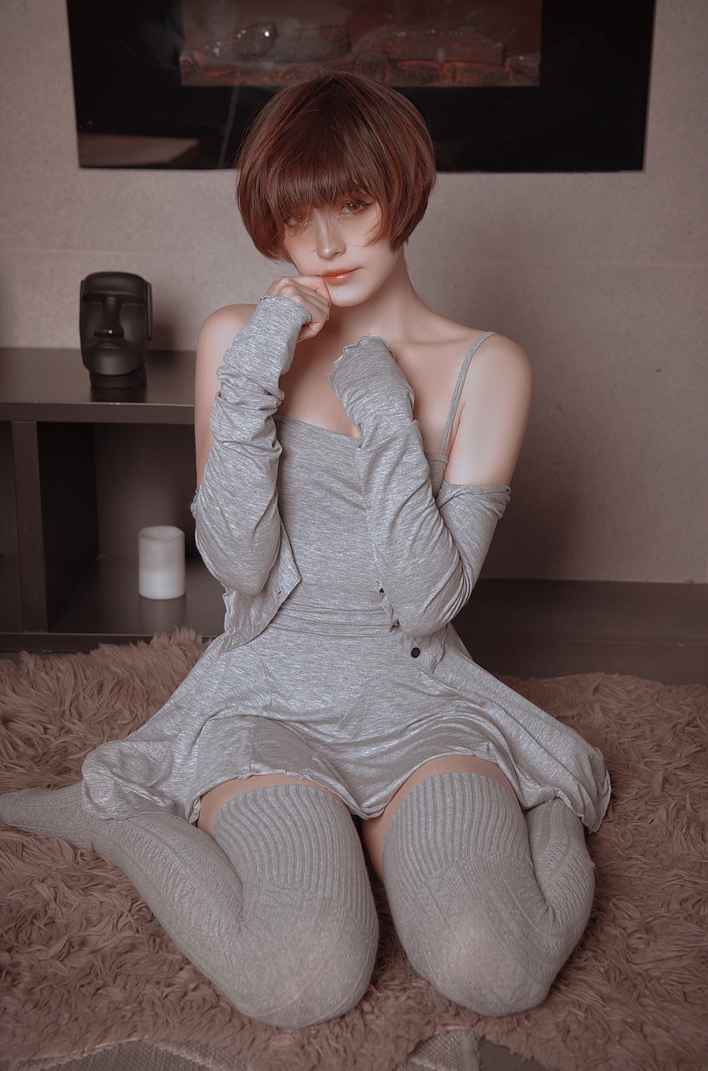 People 992x1500 Karina Salakhutdinova women redhead bob hairstyle grey clothing thigh high socks sculpture bangs carpet