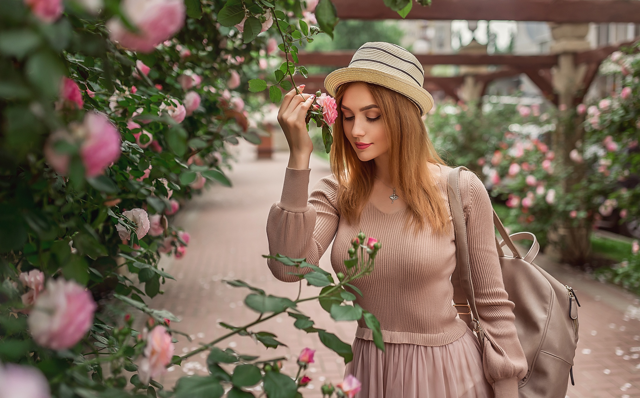 People 2200x1370 flowers women model Kristina Kardava women with hats necklace rose women outdoors one arm up backpacks sweater looking below pink dress