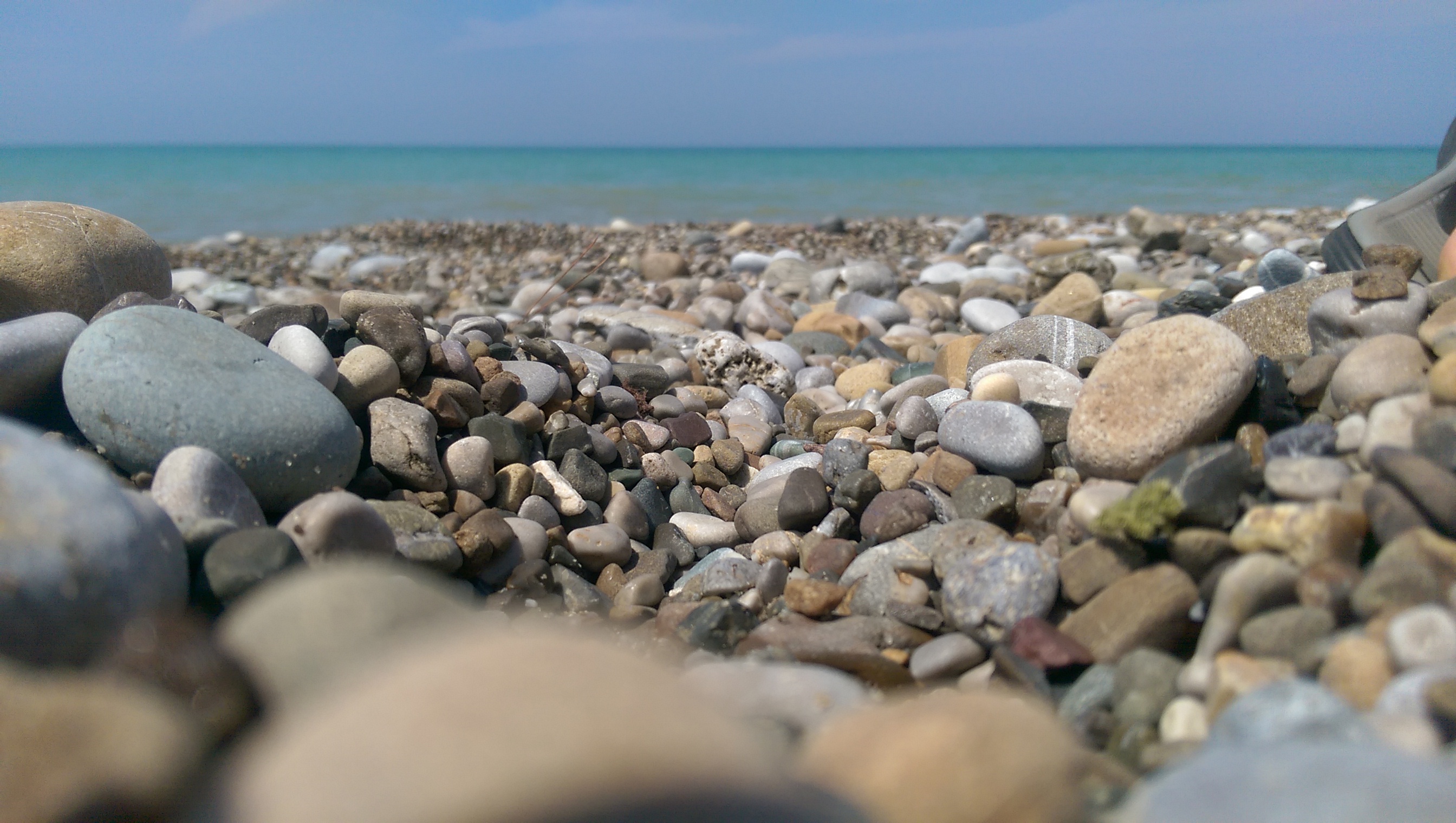 General 2688x1520 beach stones sea horizon